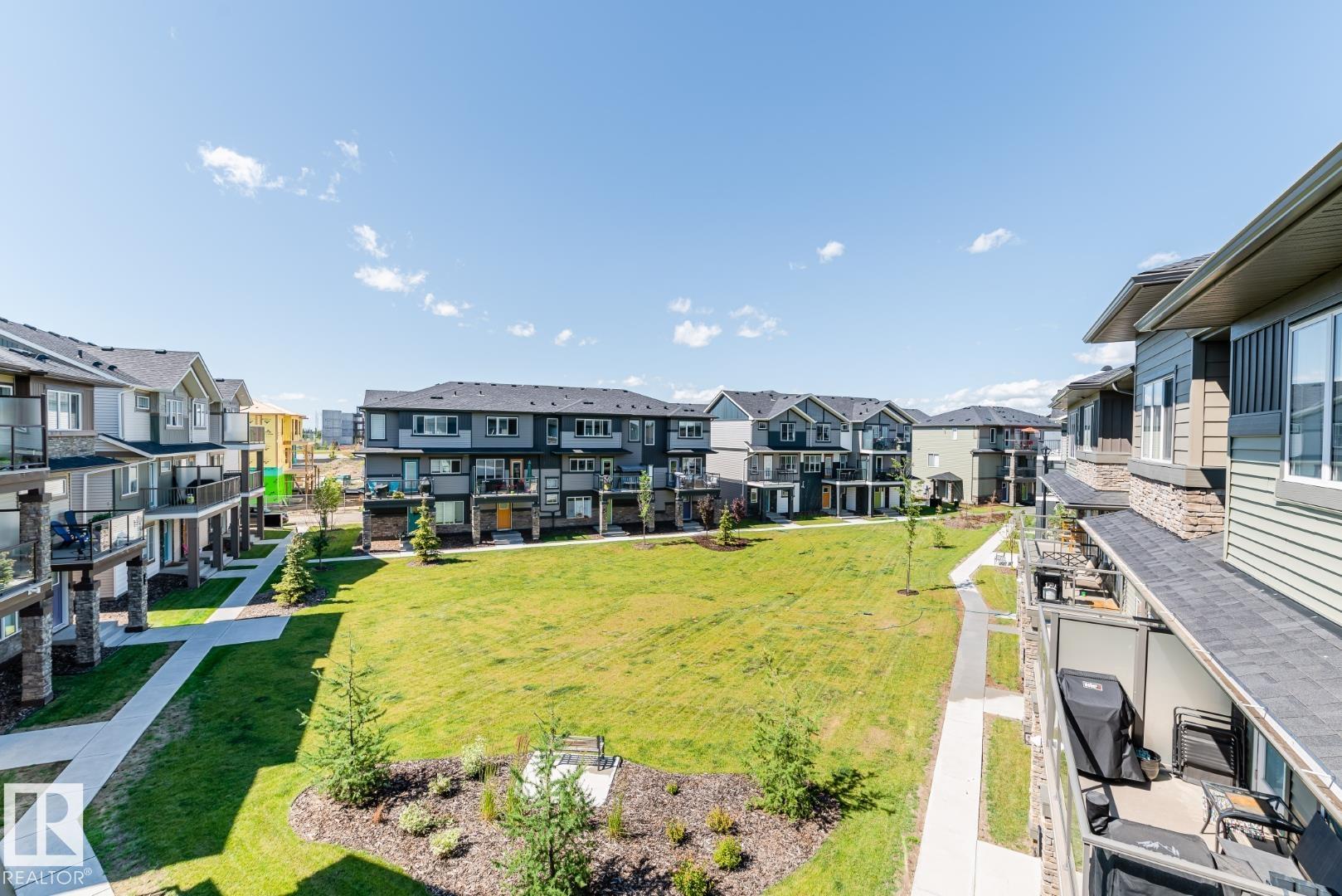Photo 32 at 81 - 1530 Tamarack Boulevard NW, Tamarack, Edmonton