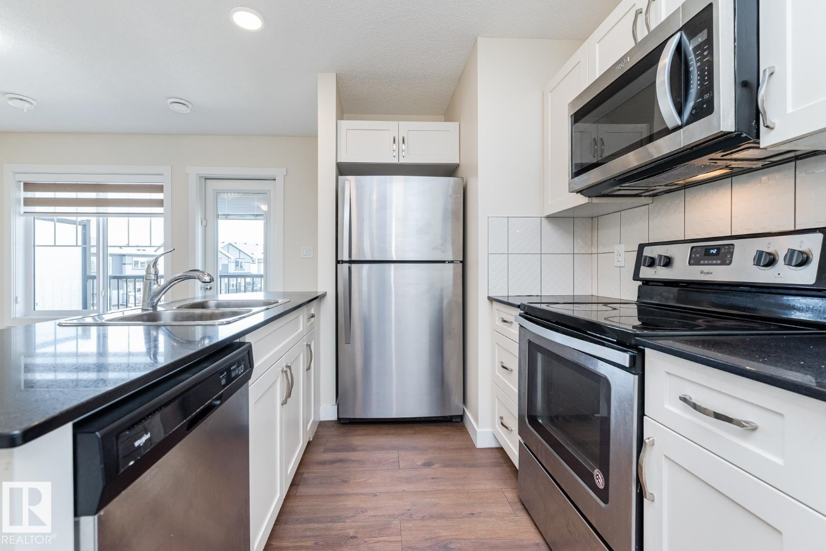 Photo 7 at 81 - 1530 Tamarack Boulevard NW, Tamarack, Edmonton