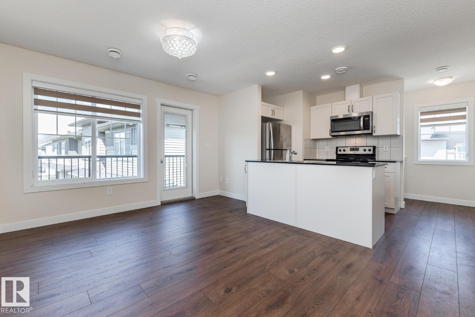 Photo 10 at 81 - 1530 Tamarack Boulevard NW, Tamarack, Edmonton