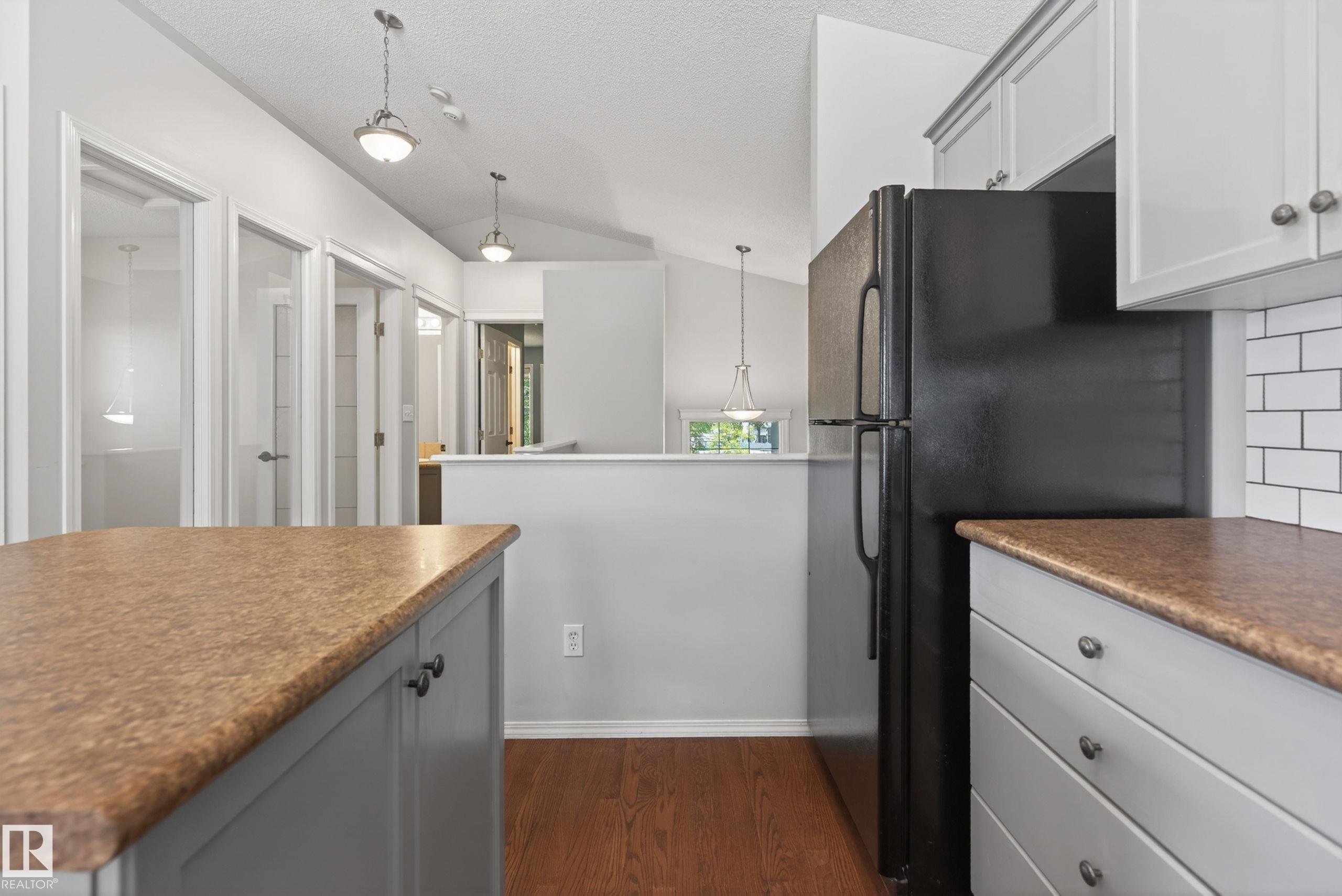 Photo 9 at 7815 14 Avenue SW, Summerside, Edmonton