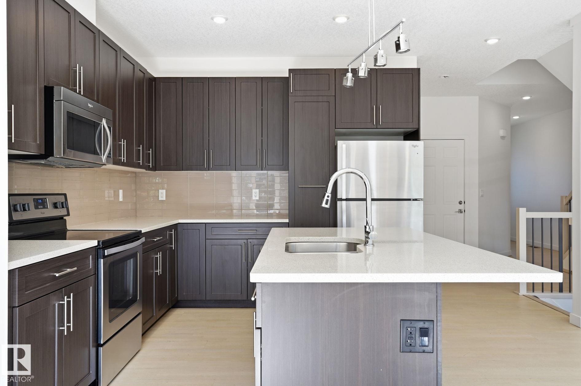 Photo 8 at 47 - 5873 Mullen Place NW, MacTaggart, Edmonton