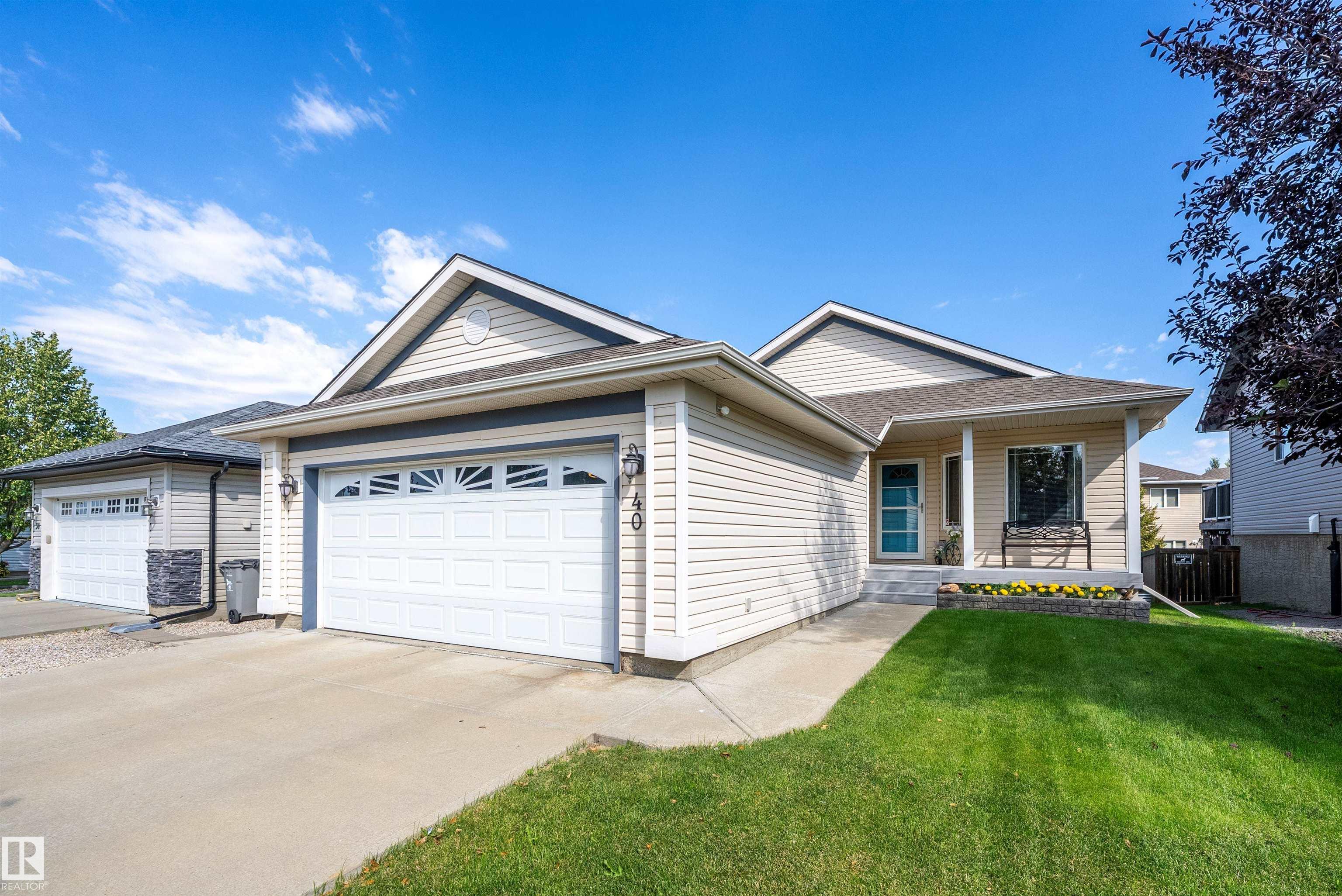WOW! You can feel the PRIDE OF OWNERSHIP in this lovely, fully developed, 1220 sq. ft. BUNGALOW in CITADEL RIDGE just steps from COLONIALE GOLF & CC. From the PICTURE PERFECT front yard, up to the VERANDAH & into the OPEN CONCEPT DESIGN featuring VAULTED CEILINGS, a DEN off the FOYER & LAUNDRY ROOM with storage & GARAGE ACCESS. The U shaped MAPLE KITCHEN features gorgeous "ARTUSE GRANITE", a GAS STOVE & a SPACIOUS DINING ROOM with access to the 2 LEVEL DECKS & YARD. Rich flooring throughout with a BRAZILIAN WALNUT feel, flows into the GREATROOM which features a lovely GAS FIREPLACE with ART NICHE. There is a PANTRY, a 4 pc. main bath & 2 bedrooms, the generous PRIMARY BEDROOM features a roomy ensuite with a classic CUSTOM SHOWER. The CENTRAL STAIRCASE leads down to a spacious FAMILYROOM with FRENCH DOORS, a full bathroom & 2 ADDITIONAL ROOMS with large windows, closets & plenty of storage. Upgrades include Shingles 2021, HWT 2025, Sump Pump 2025, plus maintenance free decks with extra storage. WOW!