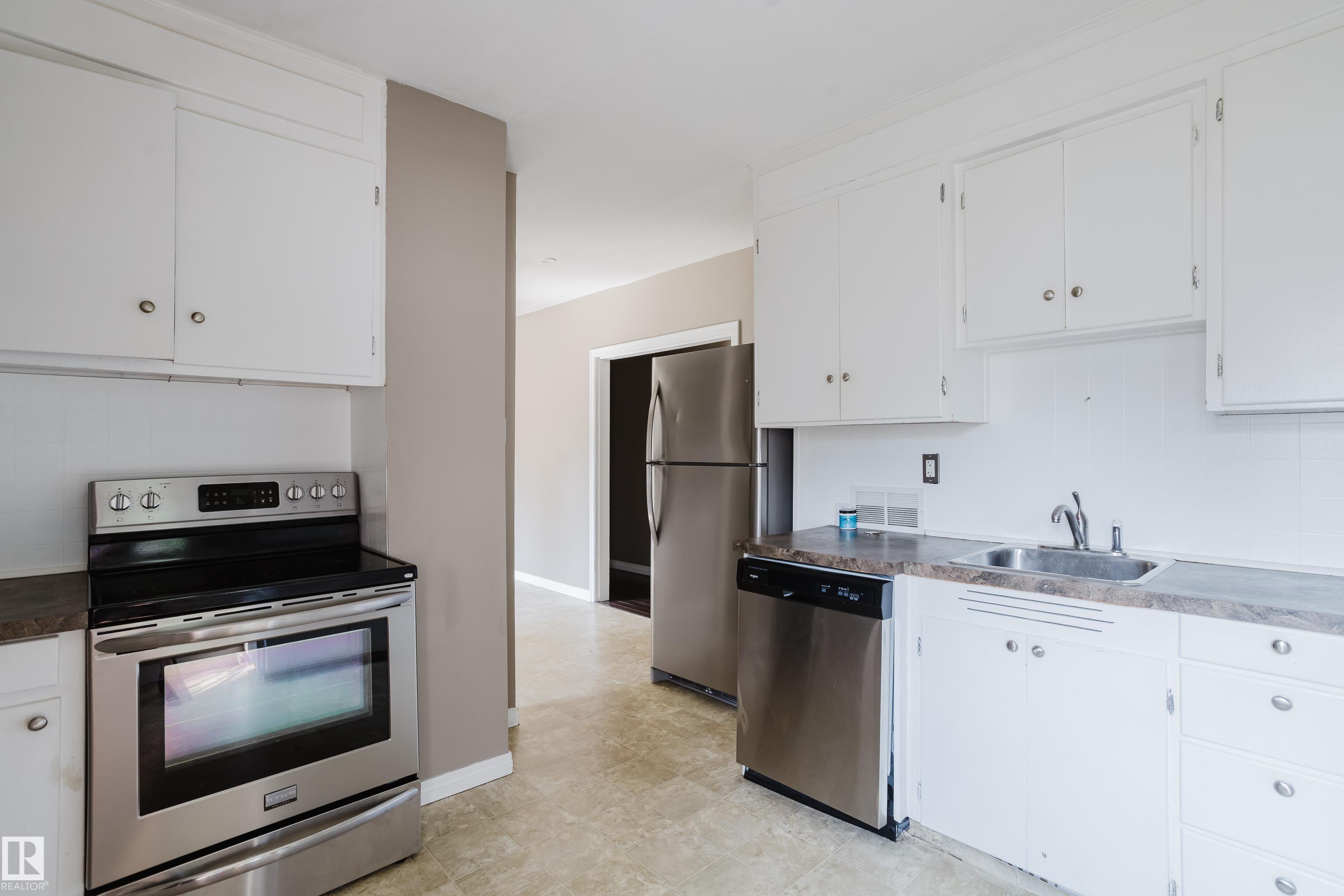 Photo 10 at 12811 117 Avenue NW, Inglewood, Edmonton