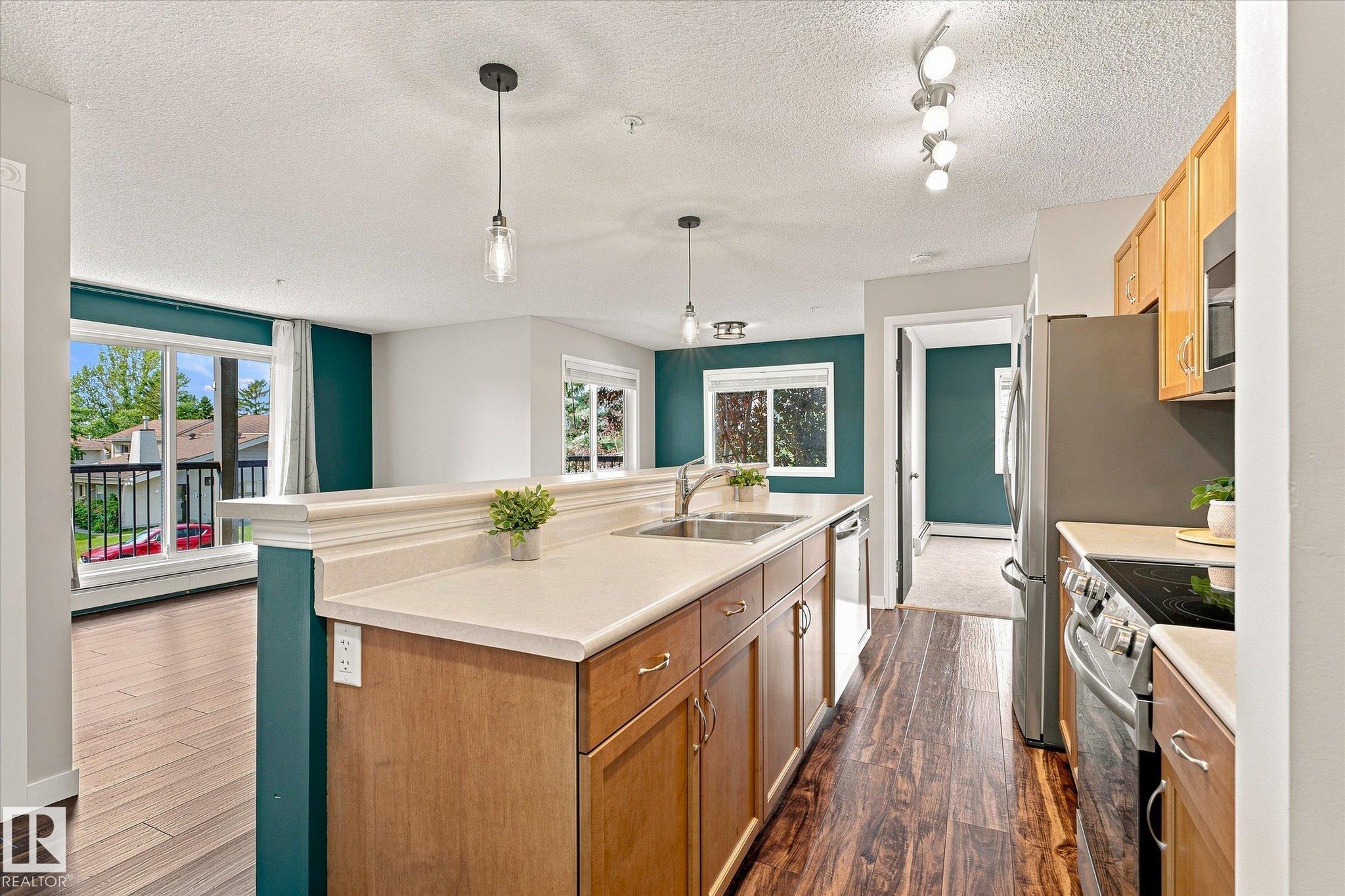 Photo 3 at 240 - 1180 Hyndman Road NW, Canon Ridge, Edmonton