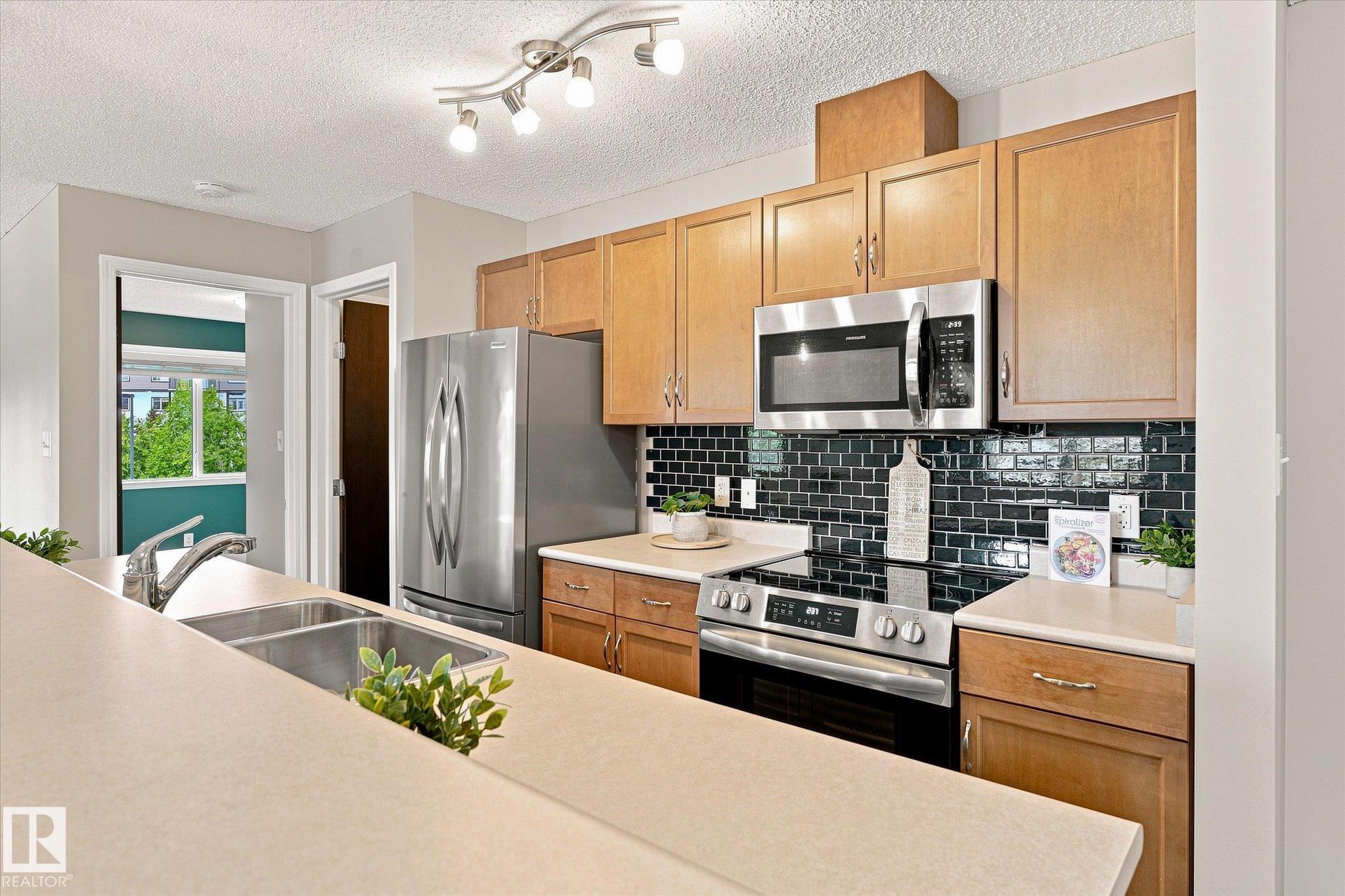 Photo 4 at 240 - 1180 Hyndman Road NW, Canon Ridge, Edmonton