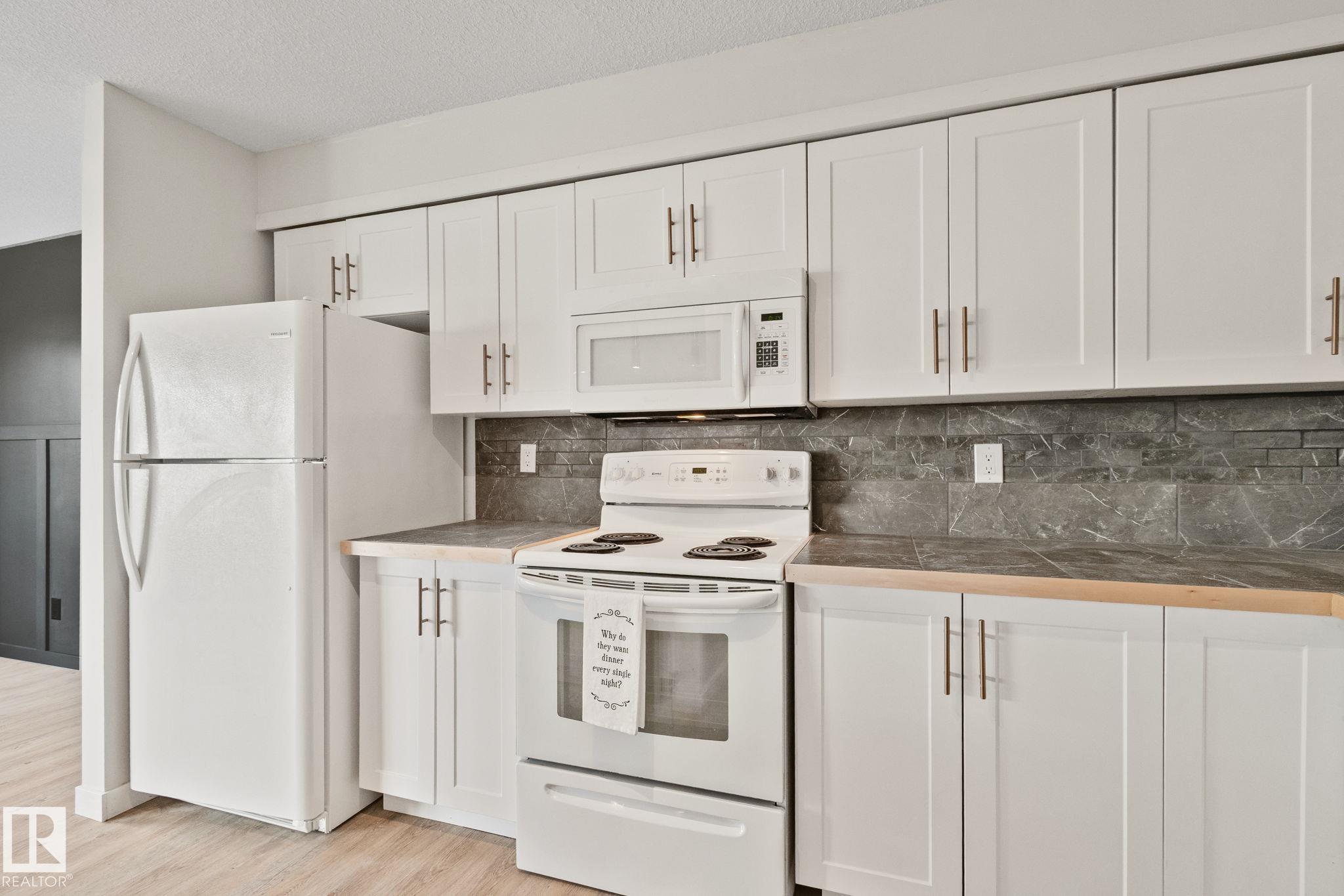 Photo 12 at 703 Grandin Drive, Morinville