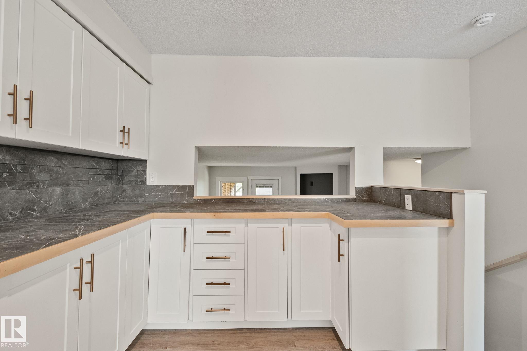 Photo 13 at 703 Grandin Drive, Morinville