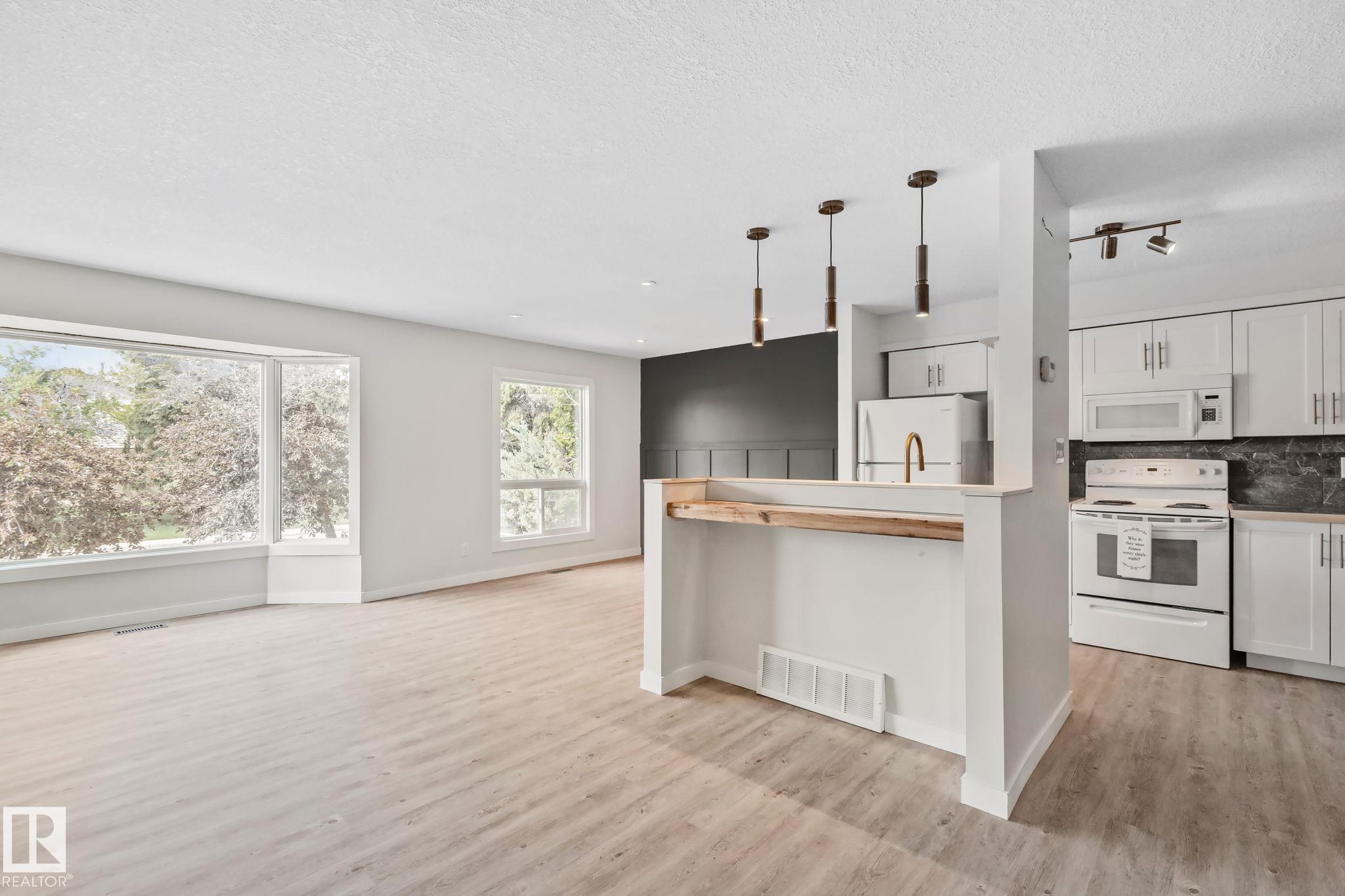 Photo 9 at 703 Grandin Drive, Morinville