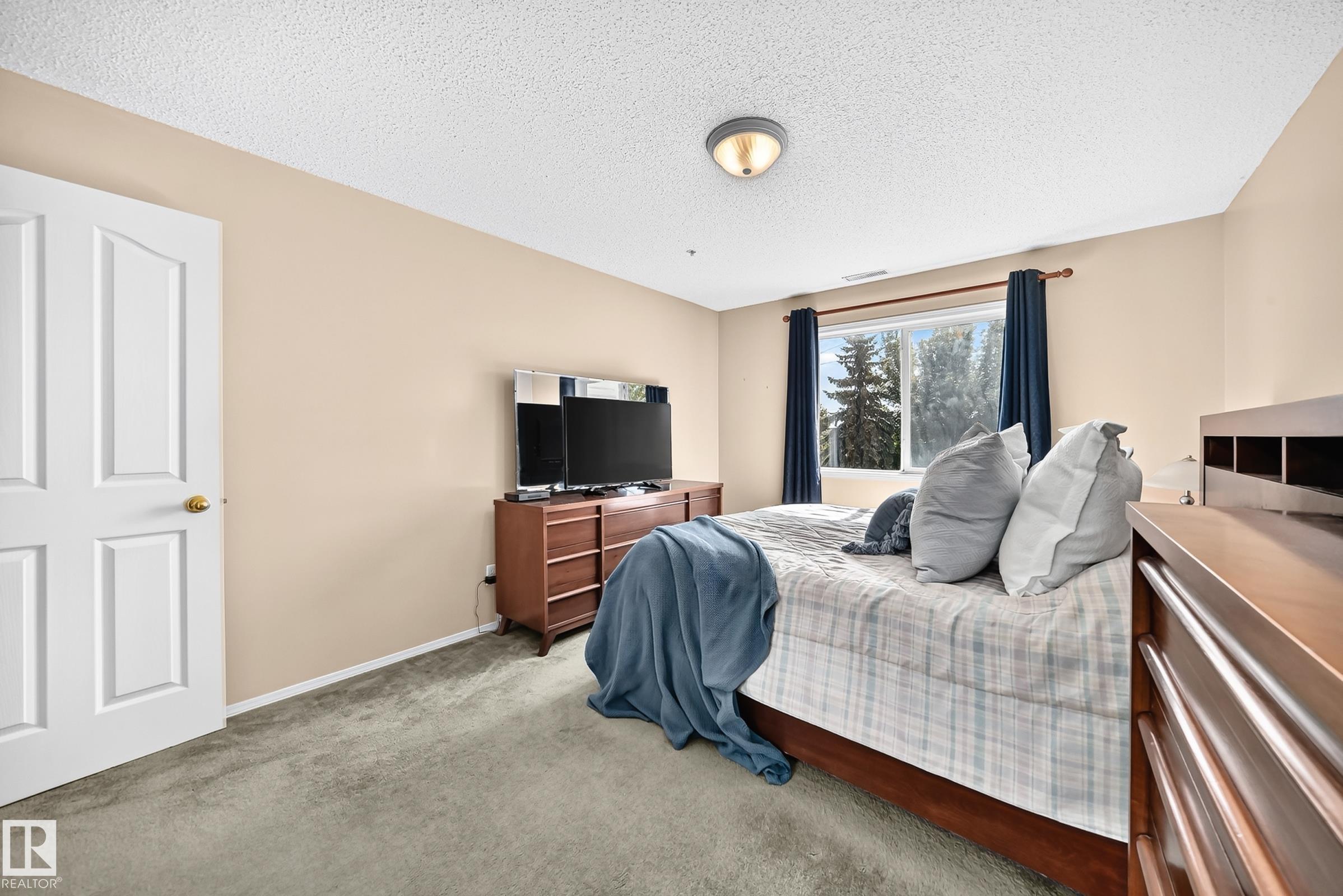 Photo 13 at 204 - 16303 95 Street NW, Eaux Claires, Edmonton