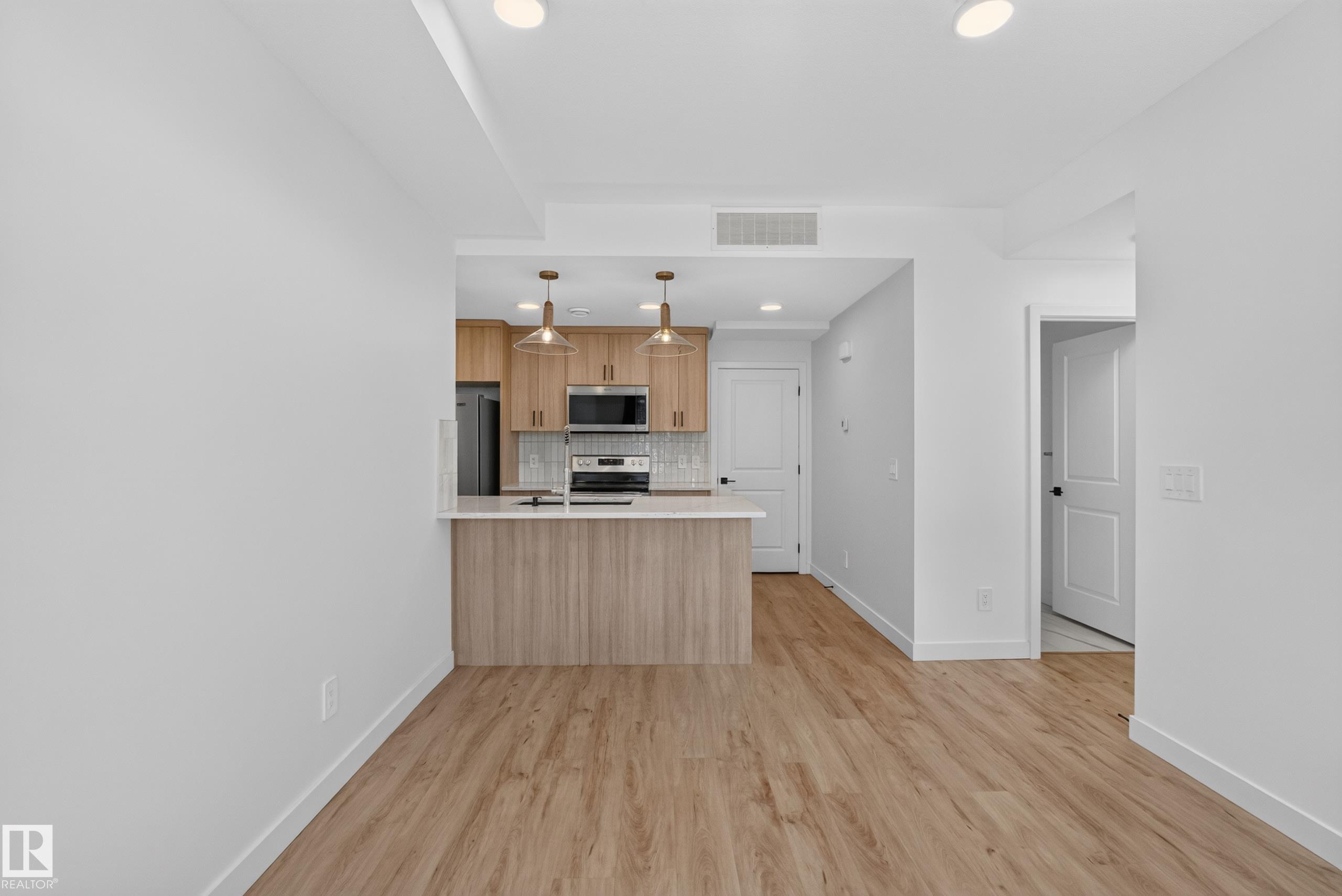 Photo 7 at 58 - 16231 19 Avenue SW, Glenridding Ravine, Edmonton