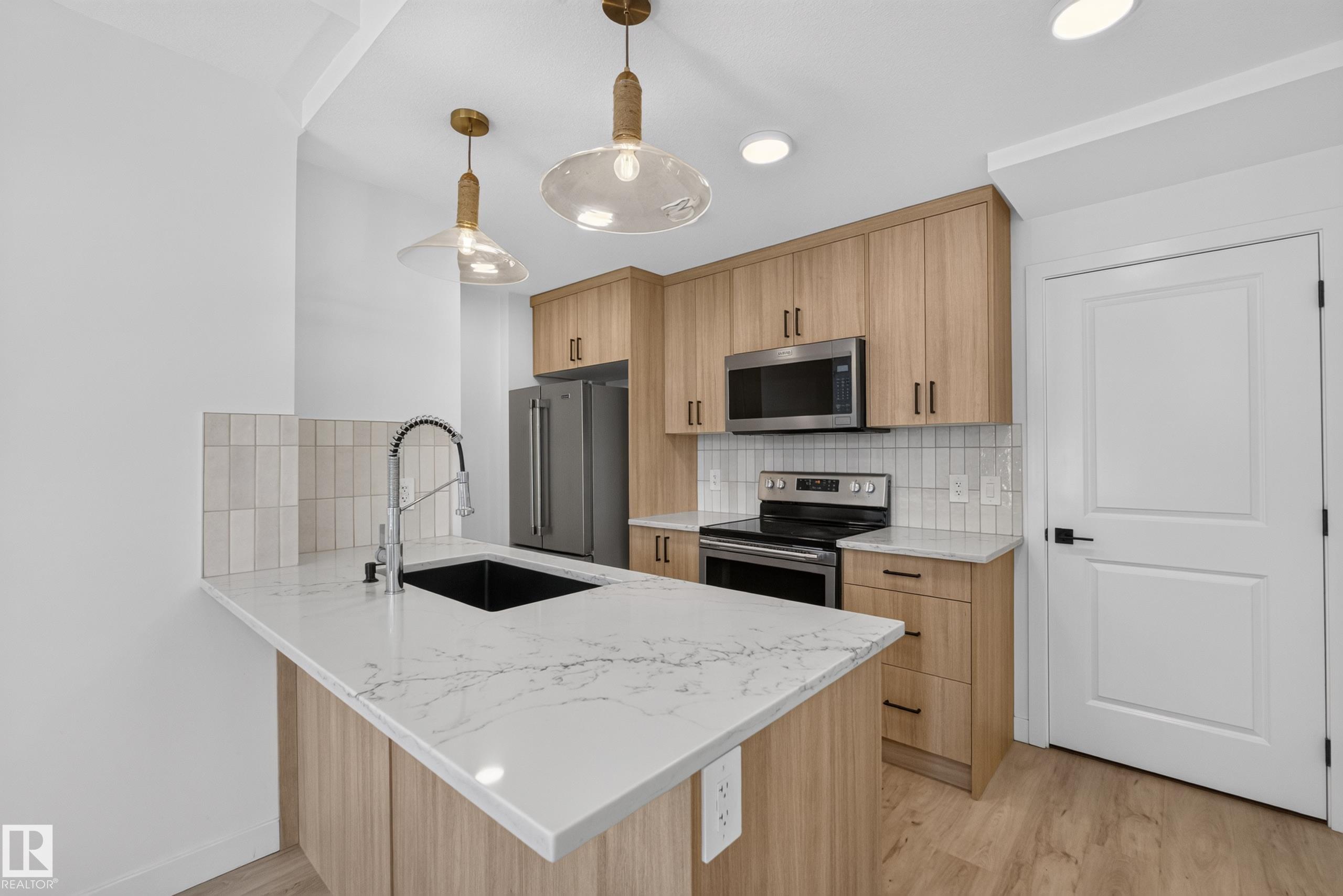 Photo 10 at 58 - 16231 19 Avenue SW, Glenridding Ravine, Edmonton