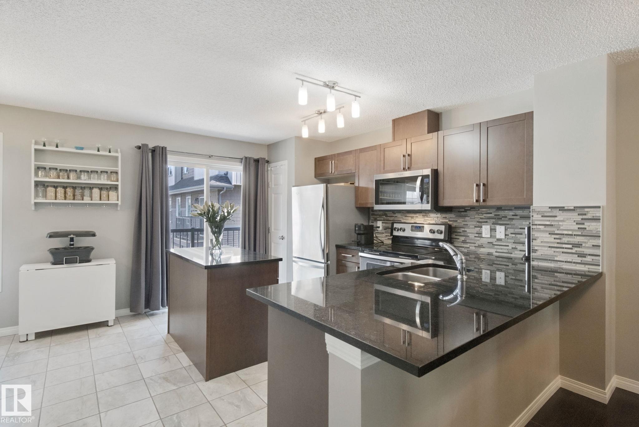 Photo 16 at 58 - 4029 Orchards Drive SW, The Orchards At Ellerslie, Edmonton