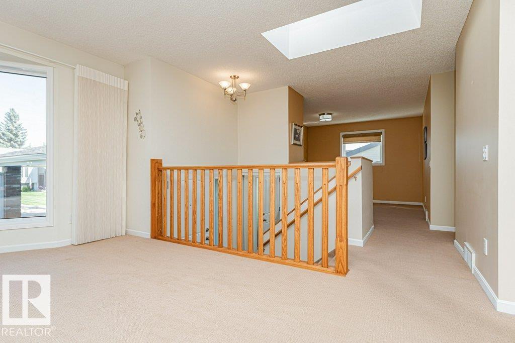 Photo 11 at 10439 14 Avenue NW, Bearspaw, Edmonton