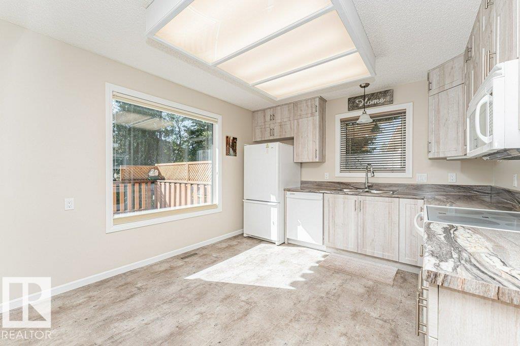 Photo 16 at 10439 14 Avenue NW, Bearspaw, Edmonton