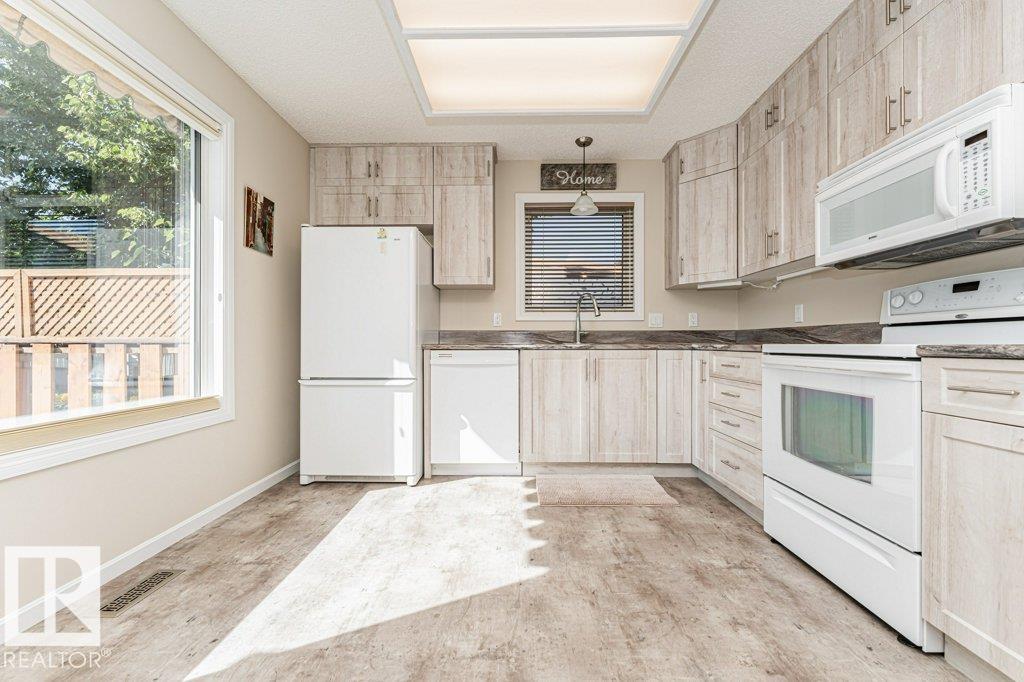 Photo 17 at 10439 14 Avenue NW, Bearspaw, Edmonton