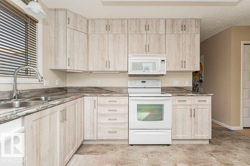 Photo 18 at 10439 14 Avenue NW, Bearspaw, Edmonton