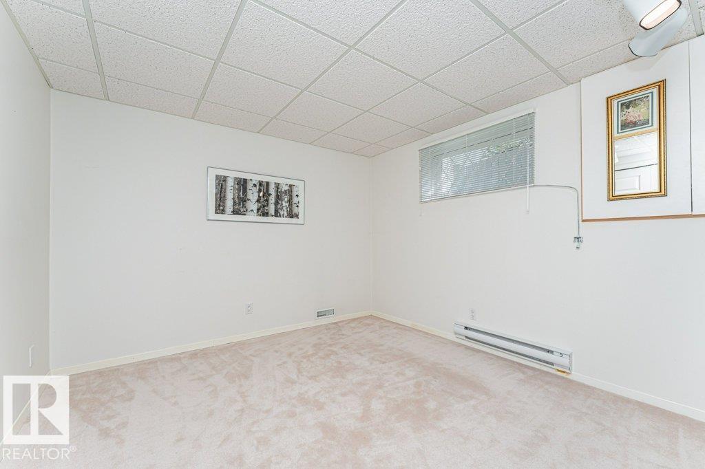 Photo 39 at 10439 14 Avenue NW, Bearspaw, Edmonton