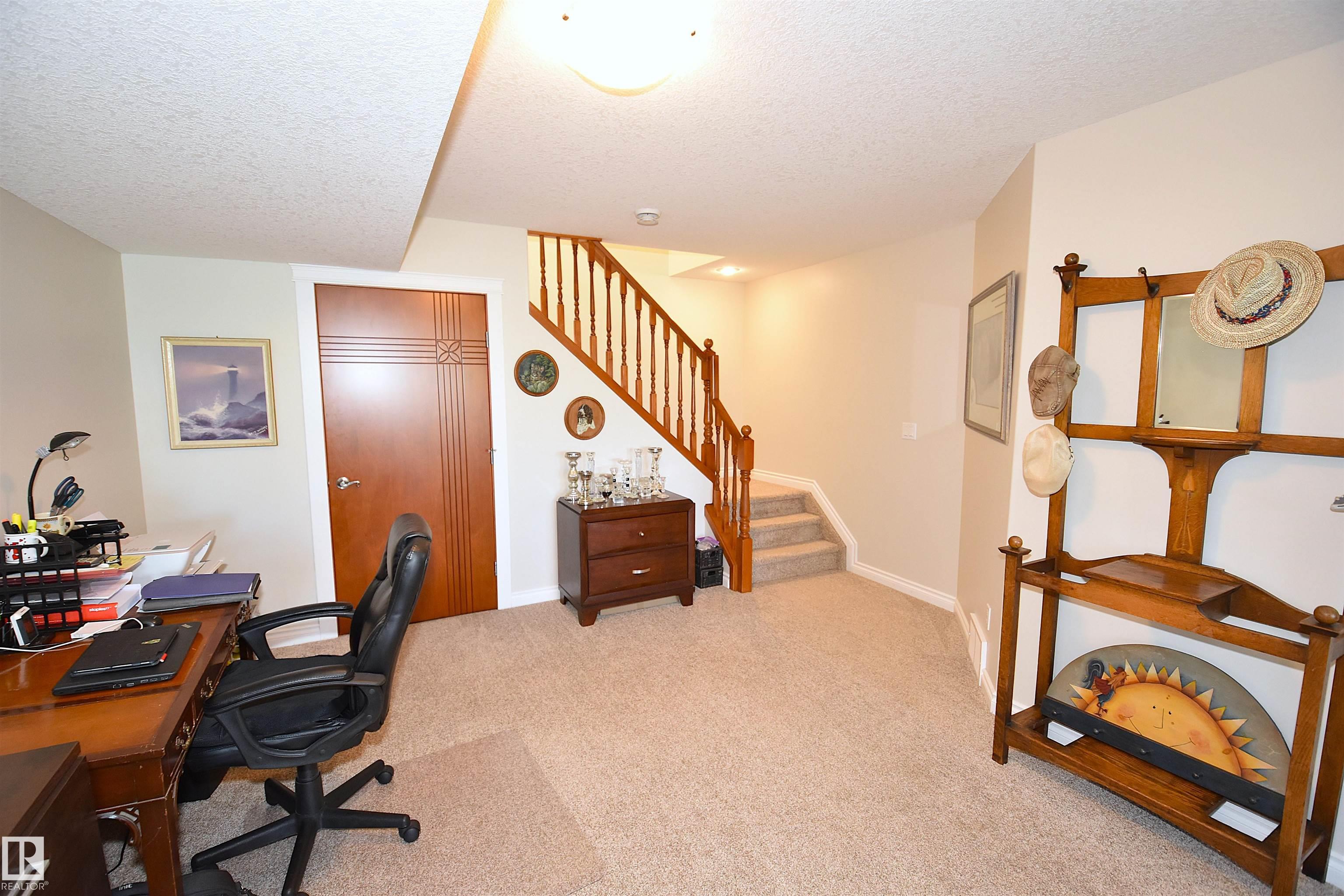 Photo 32 at 10 - 10500 103 Avenue, Morinville