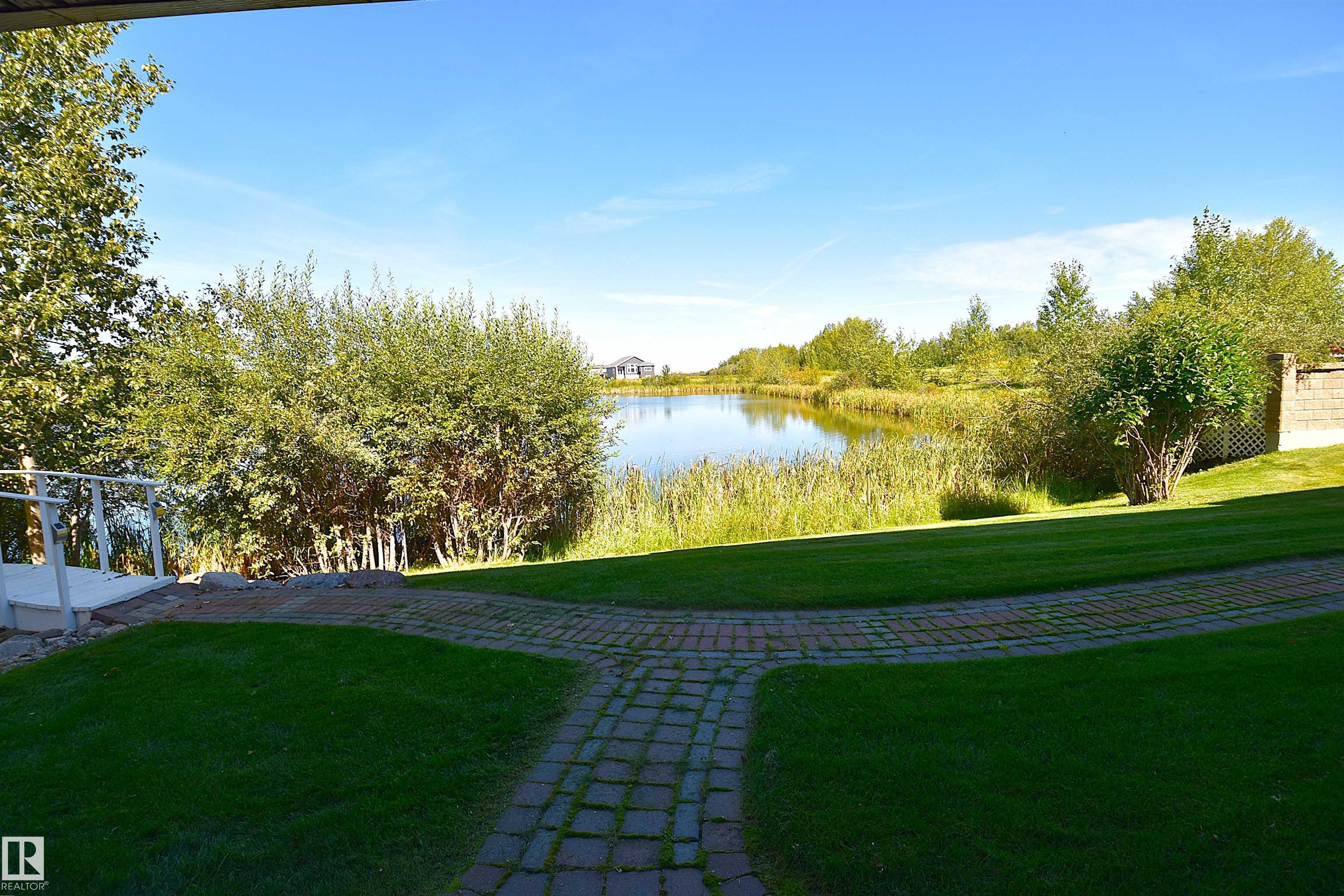 Photo 48 at 10 - 10500 103 Avenue, Morinville