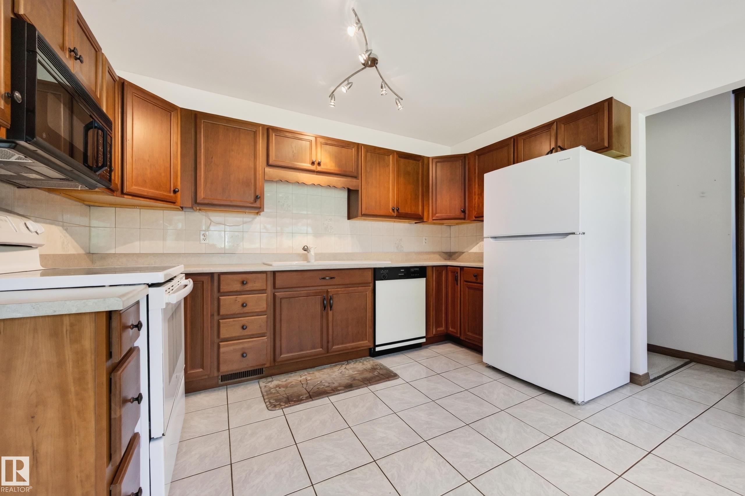 Photo 10 at 206 - 52063 Rge Road 225, Springhill Park, Rural Strathcona County