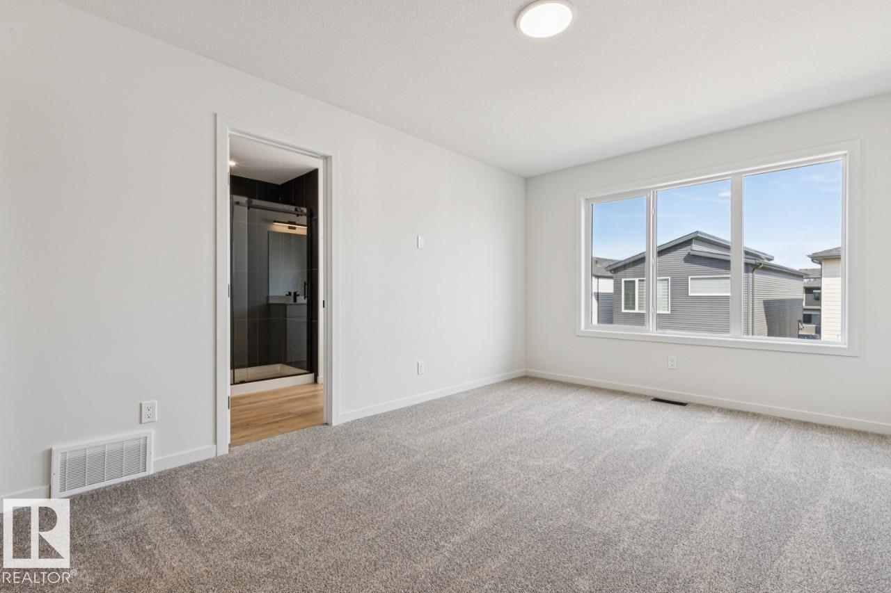 Photo 21 at 431 31 Street SW, Alces, Edmonton