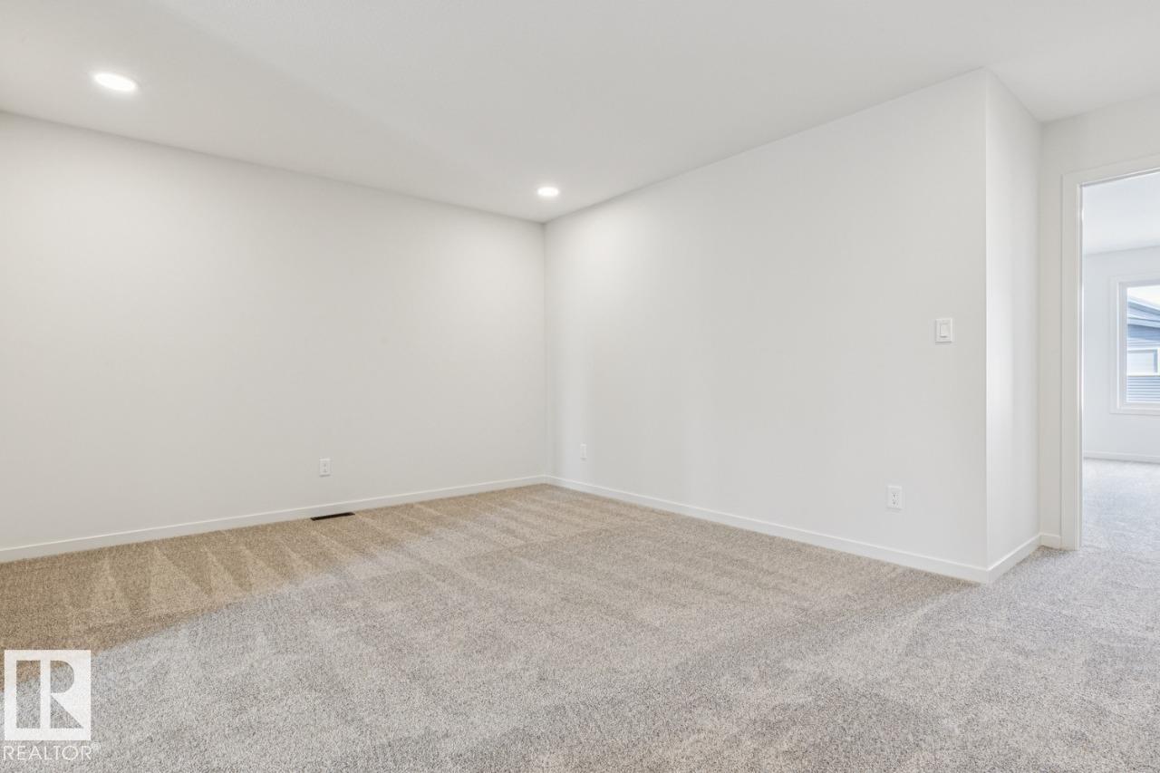 Photo 32 at 431 31 Street SW, Alces, Edmonton