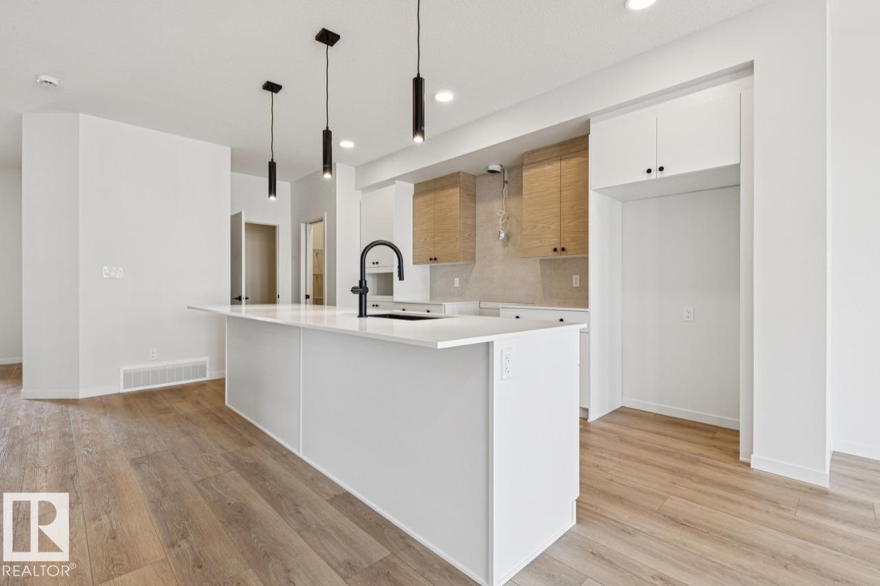 Photo 8 at 431 31 Street SW, Alces, Edmonton