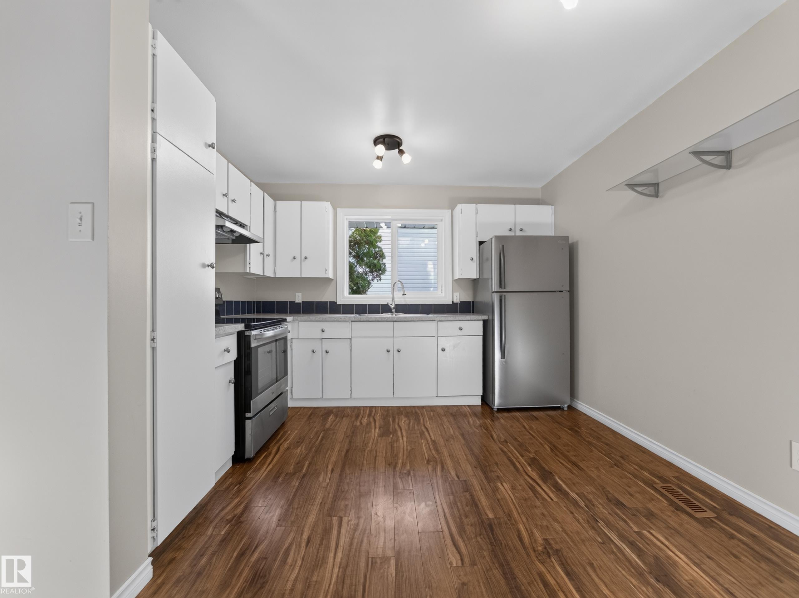 Photo 8 at 57 Woodvale Village NW, Greenview, Edmonton