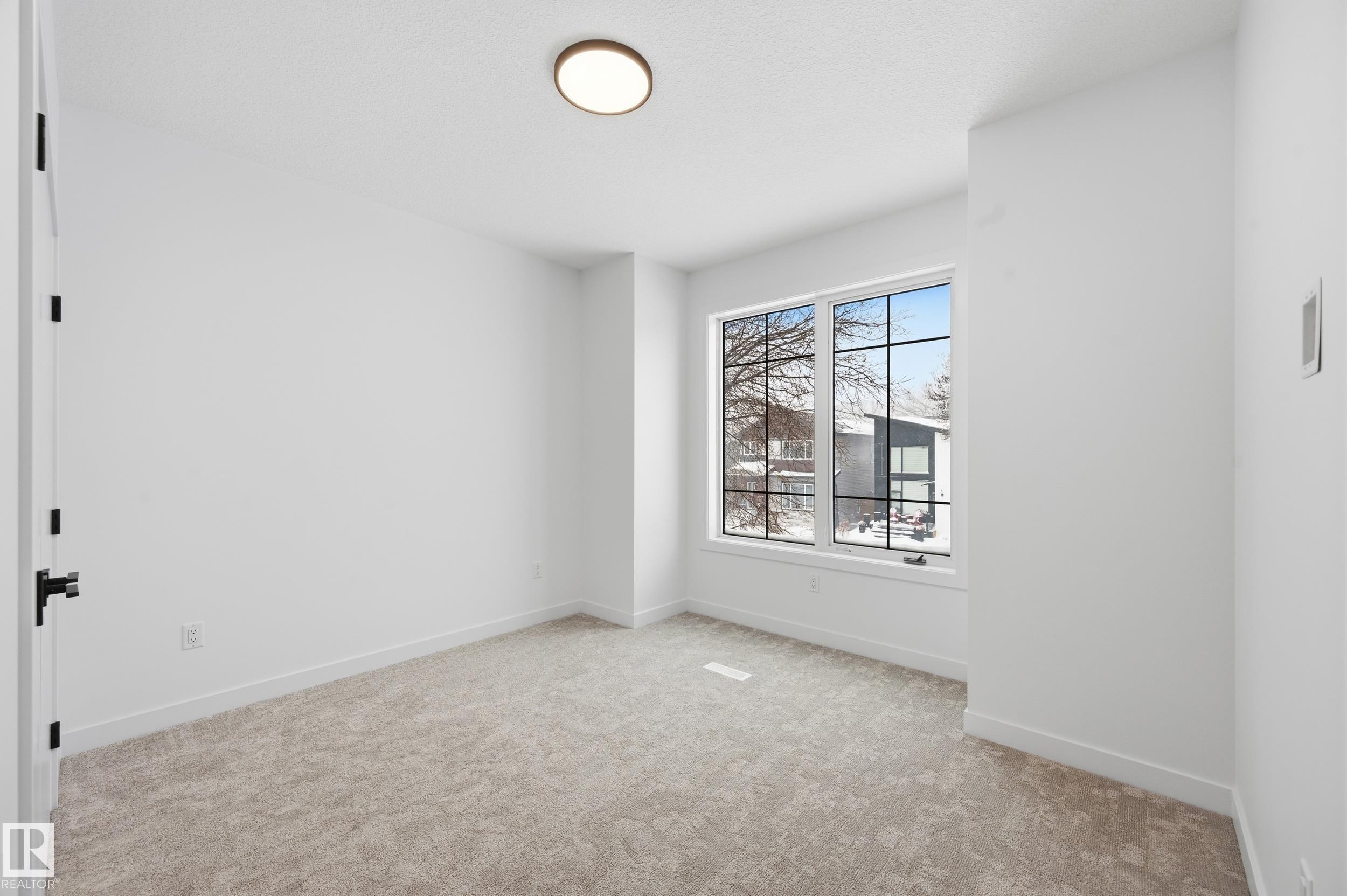 Photo 37 at 11121 51 Street NW, Highlands, Edmonton