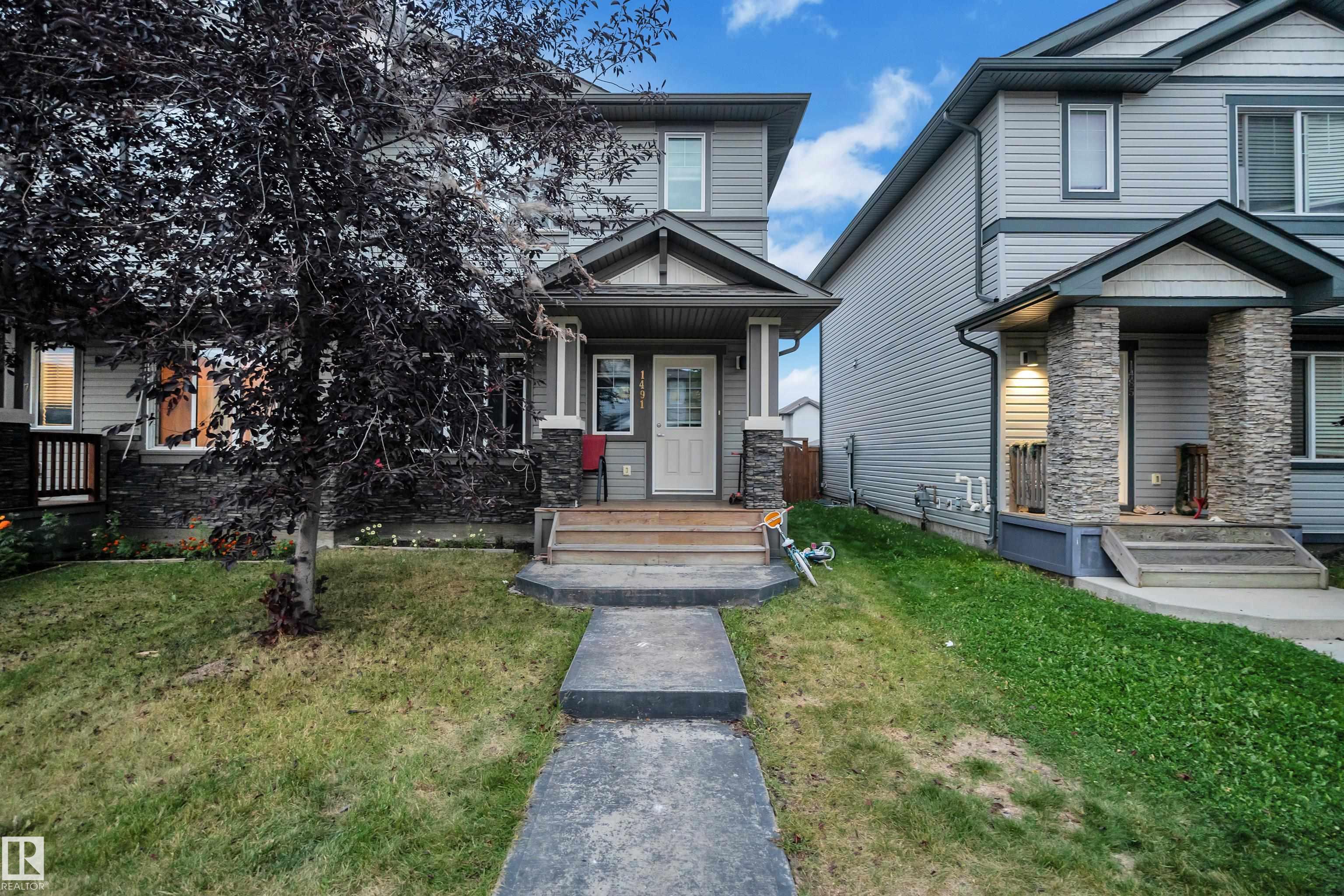 Welcome to this well-maintained 2-storey half duplex in the desirable community of Laurel! Featuring 4 bedrooms, 3 bathrooms and a partially finished basement, this home offers a functional layout with plenty of space for the whole family. The main floor features a bright living room, dining area, kitchen and family room, while upstairs offers a comfortable primary bedroom plus two additional bedrooms. The partially finished basement provides excellent additional living space , a full bedroom & half bathroom. Enjoy 9-ft ceilings, vinyl plank and carpet flooring, a deck, and a double detached garage. Conveniently located close to schools, shopping, playgrounds, public transit and major amenities. A great opportunity for first-time buyers, families or investors!