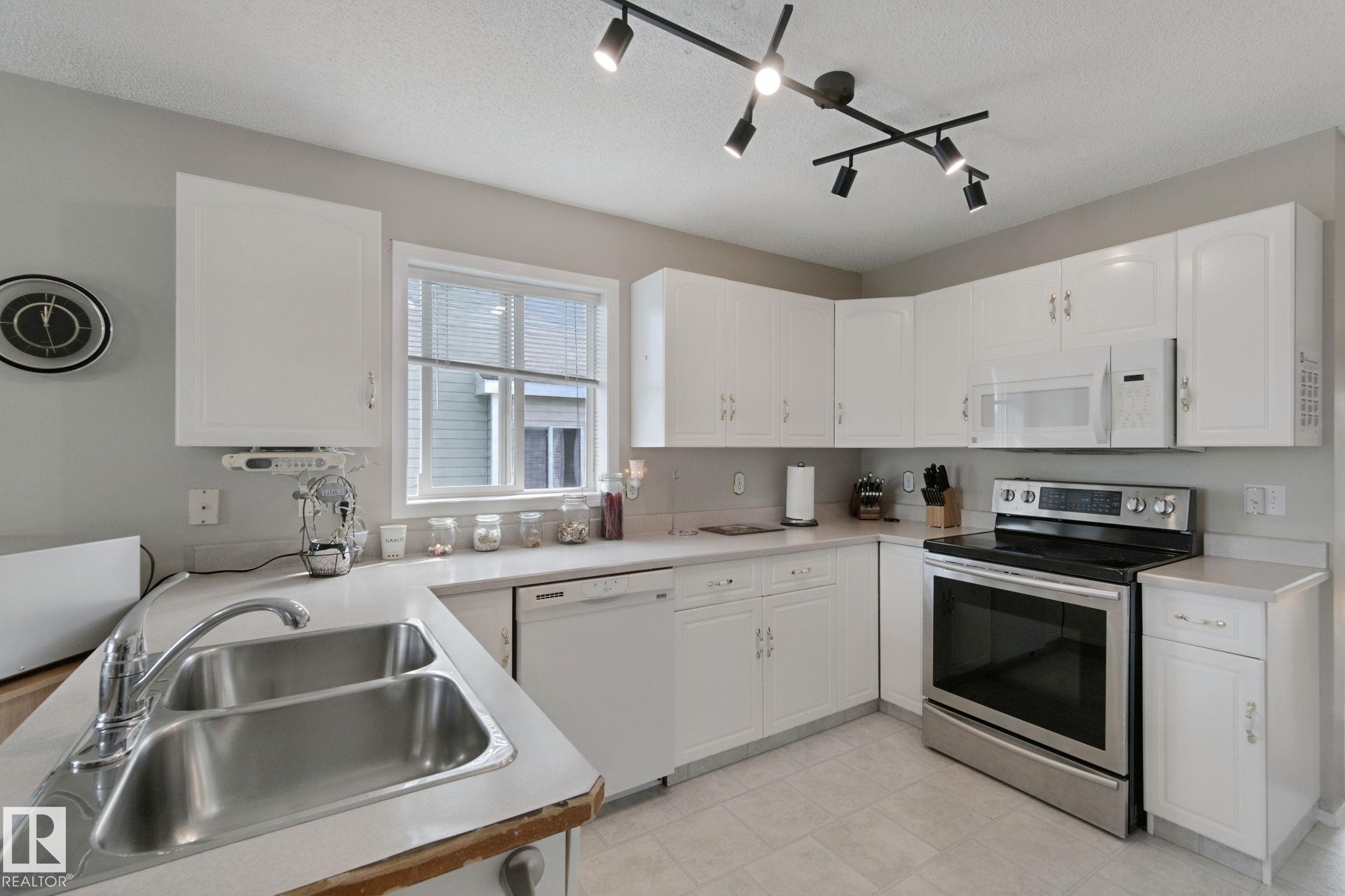 Photo 11 at 29 Highland Crescent, Heritage Lakes, St. Albert