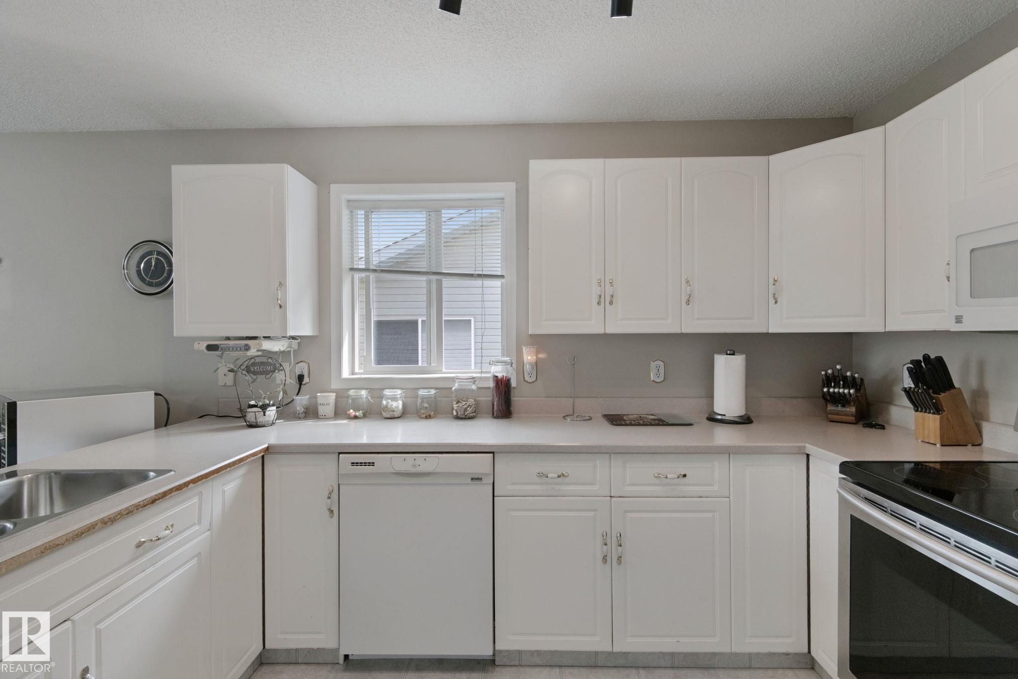 Photo 12 at 29 Highland Crescent, Heritage Lakes, St. Albert