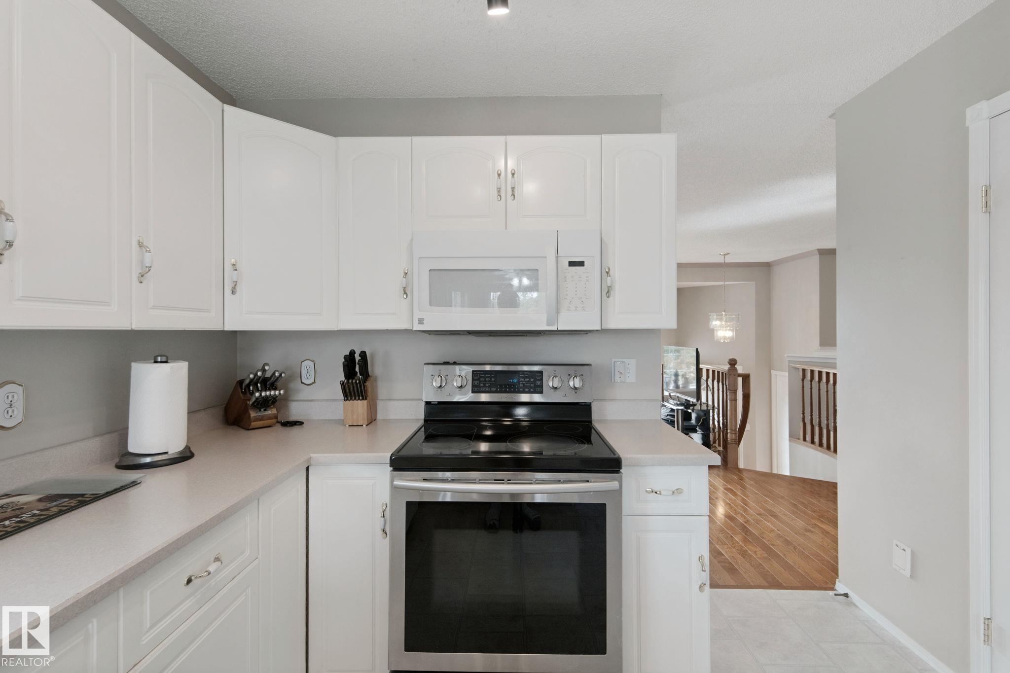 Photo 13 at 29 Highland Crescent, Heritage Lakes, St. Albert