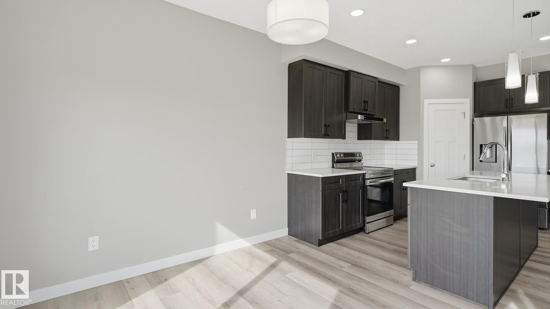 Photo 10 at 3004 9 Street NW, Maple Crest, Edmonton