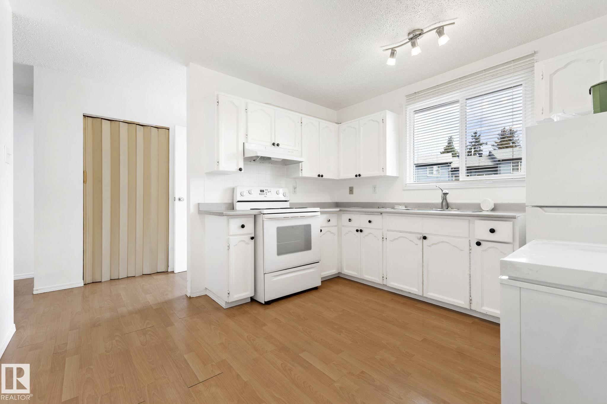 Photo 12 at 3122 142 Avenue NW, Hairsine, Edmonton