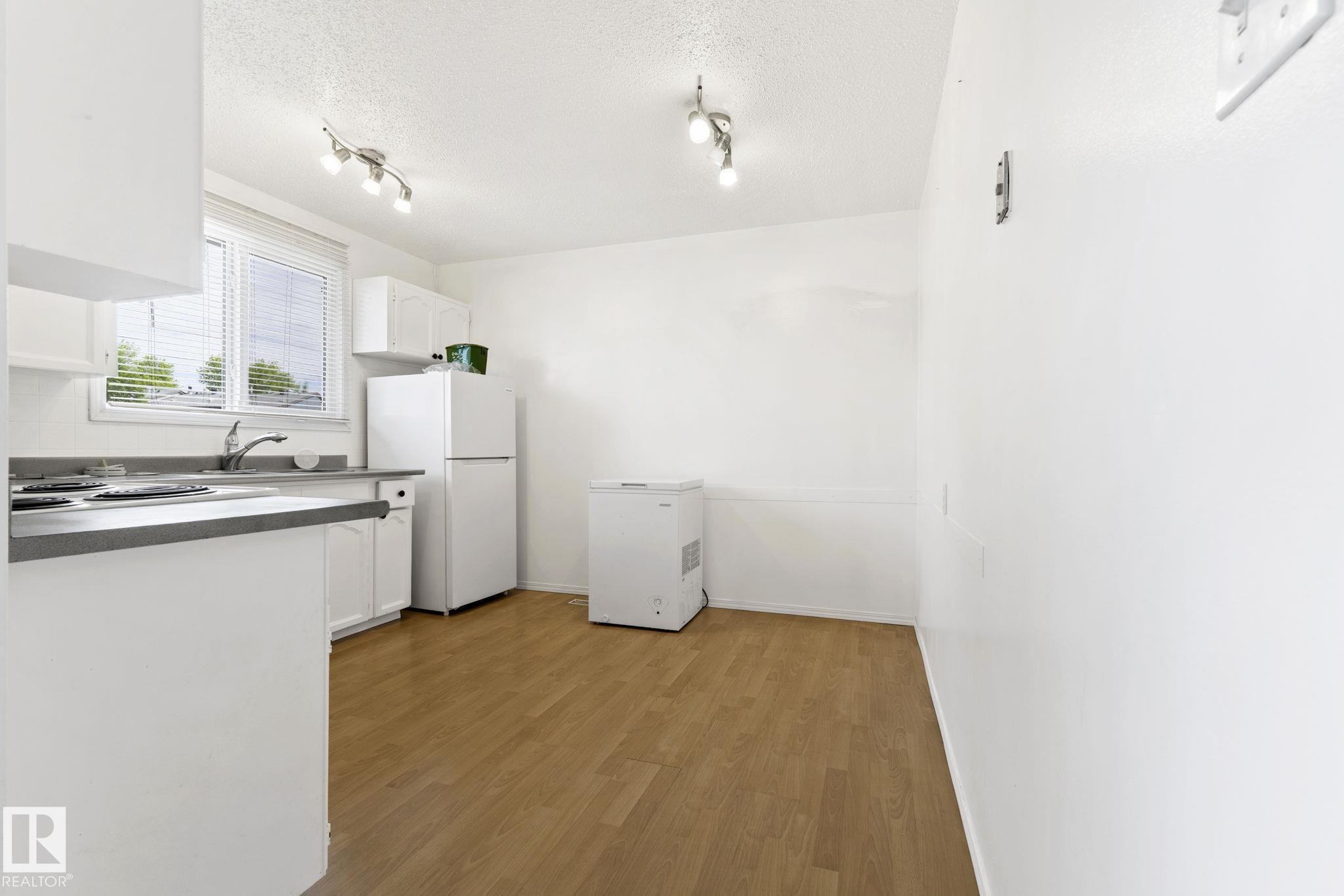 Photo 10 at 3122 142 Avenue NW, Hairsine, Edmonton