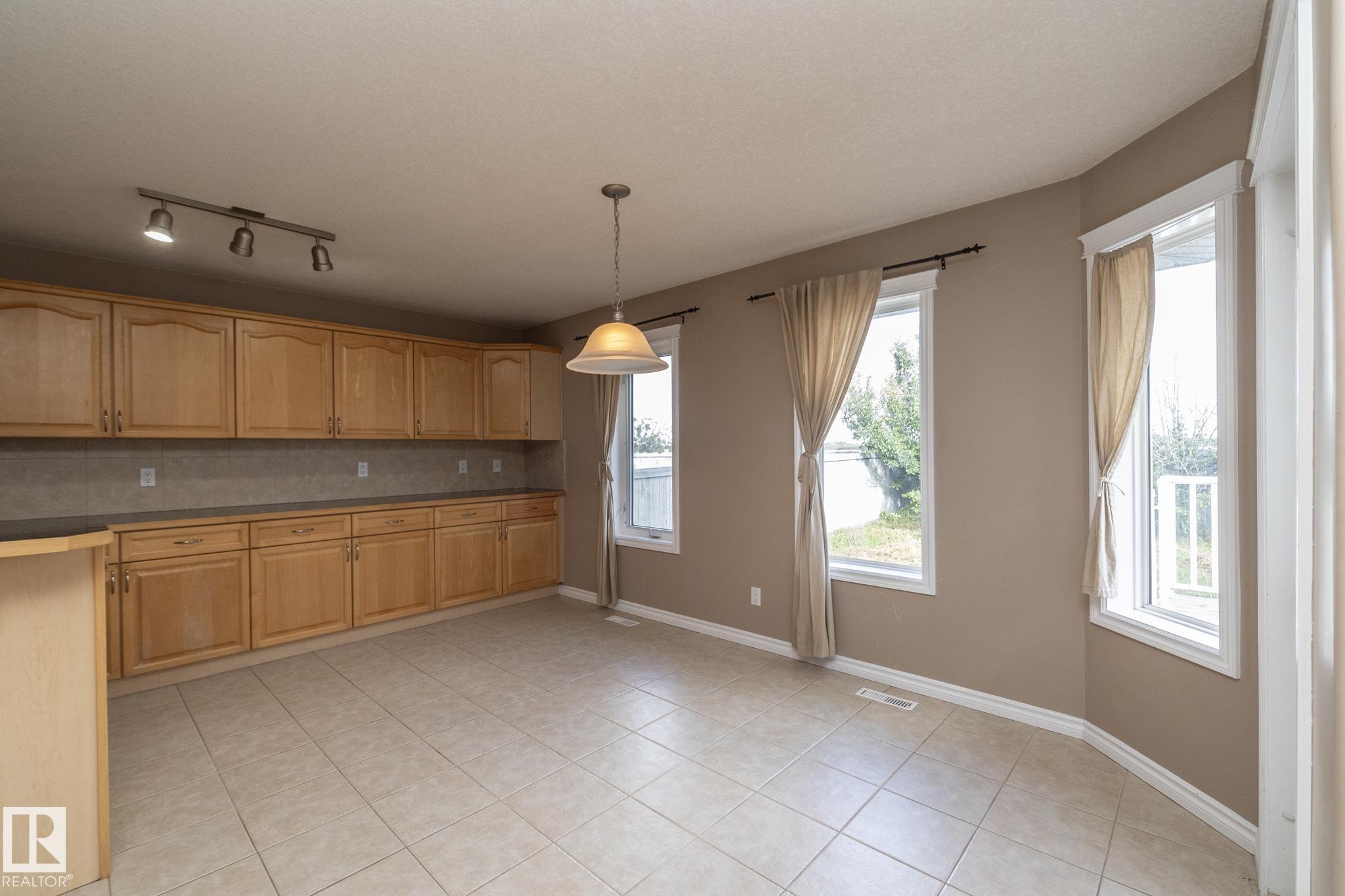 Photo 11 at 10620 183 Avenue NW, Chambery, Edmonton