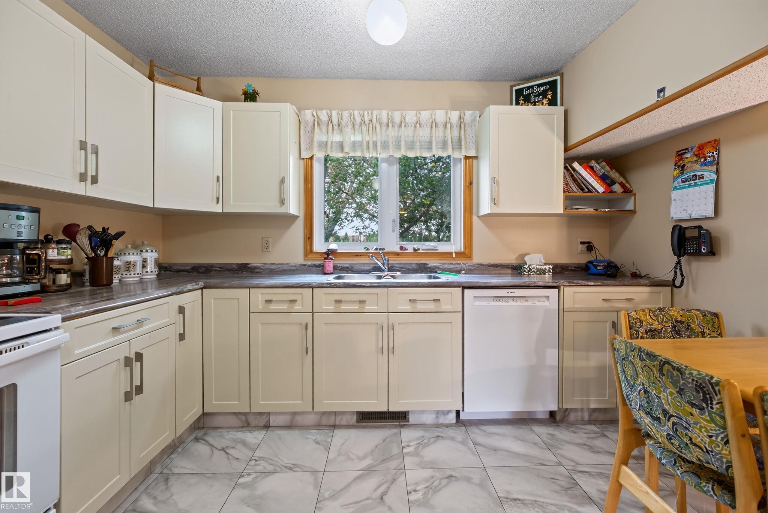 Photo 11 at 5712 123 Avenue NW, Newton, Edmonton