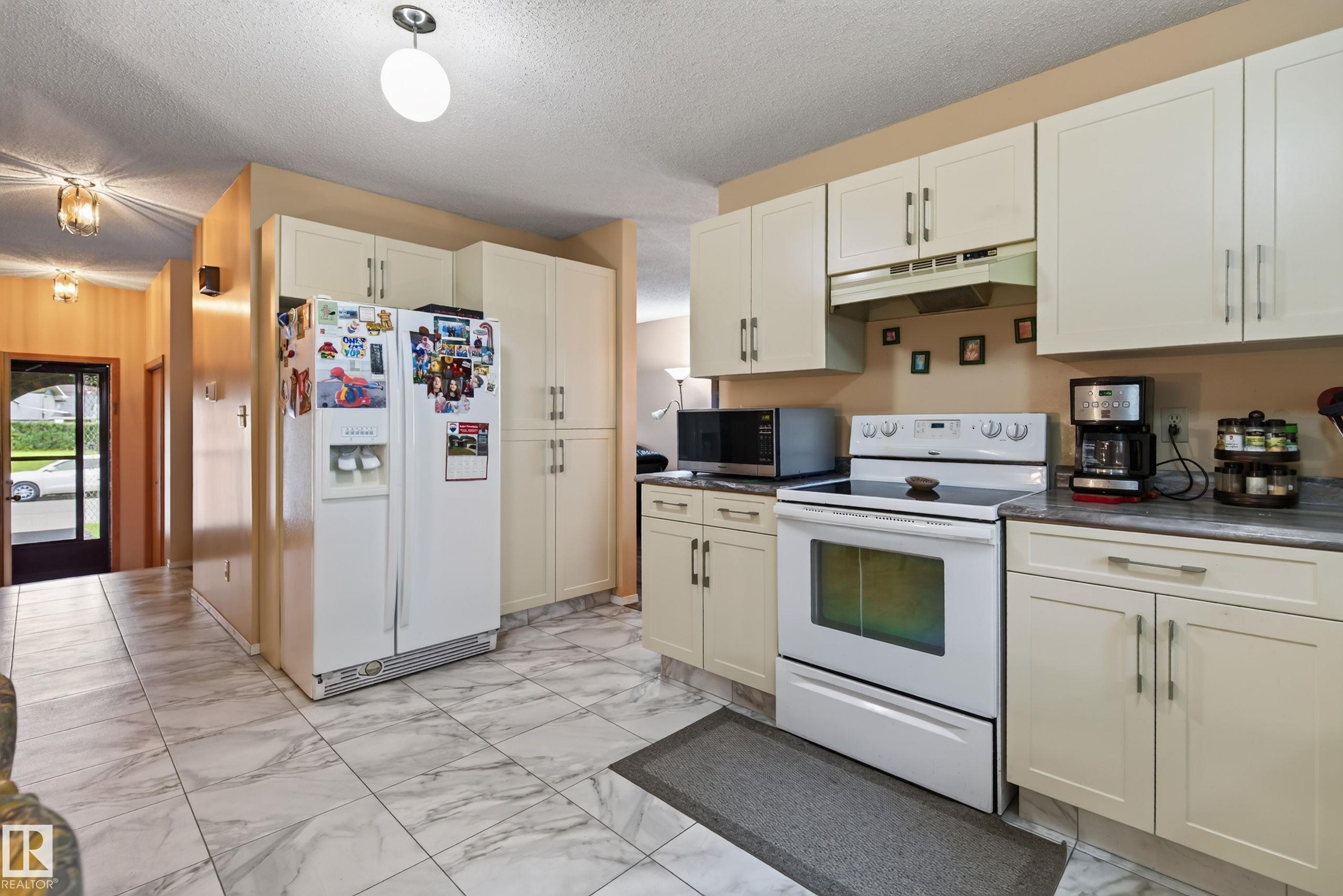 Photo 13 at 5712 123 Avenue NW, Newton, Edmonton