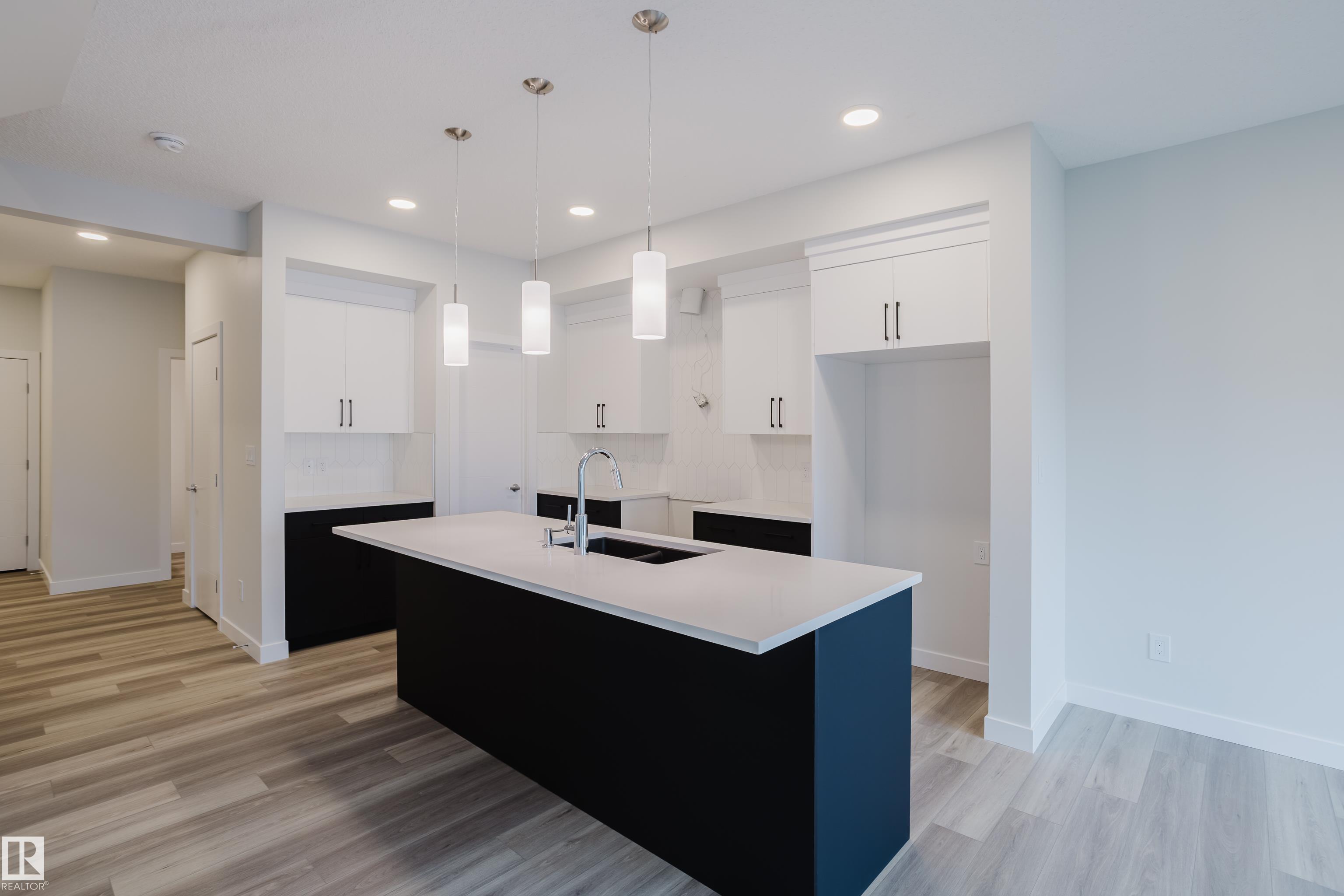 Photo 2 at 18647 19 Avenue NW, River's Edge, Edmonton