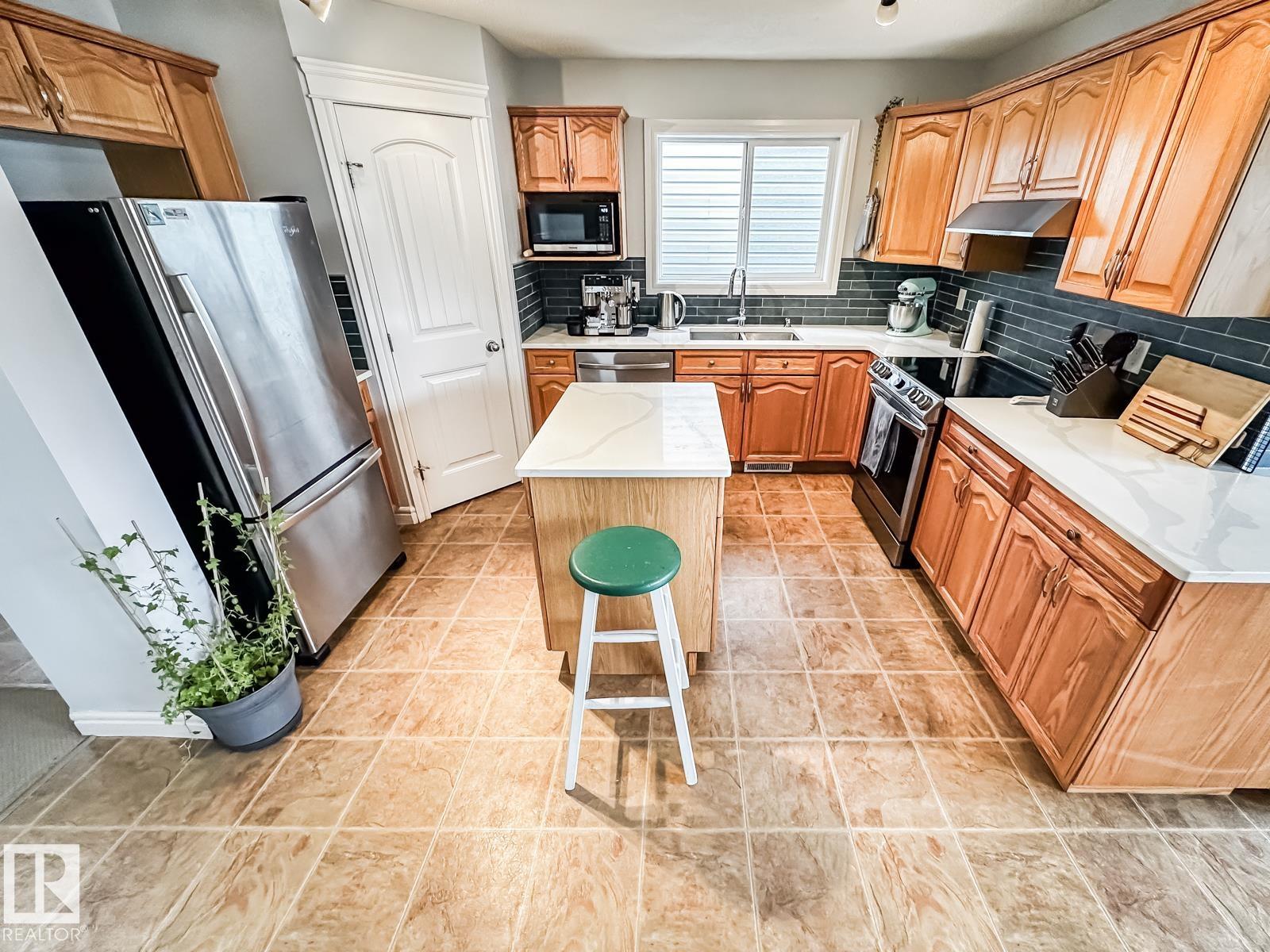 Photo 8 at 12060 19 Avenue SW, Rutherford, Edmonton
