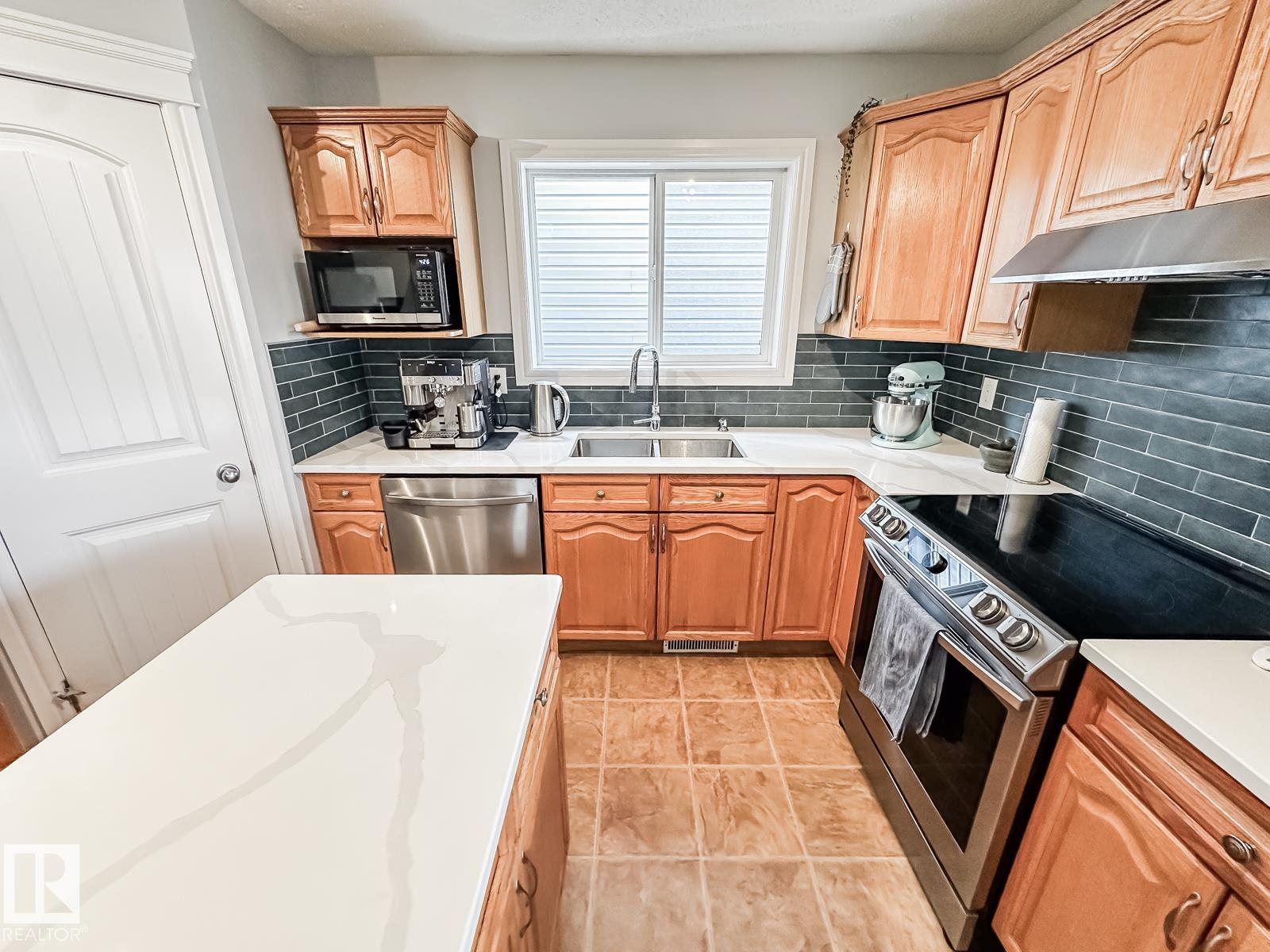 Photo 9 at 12060 19 Avenue SW, Rutherford, Edmonton