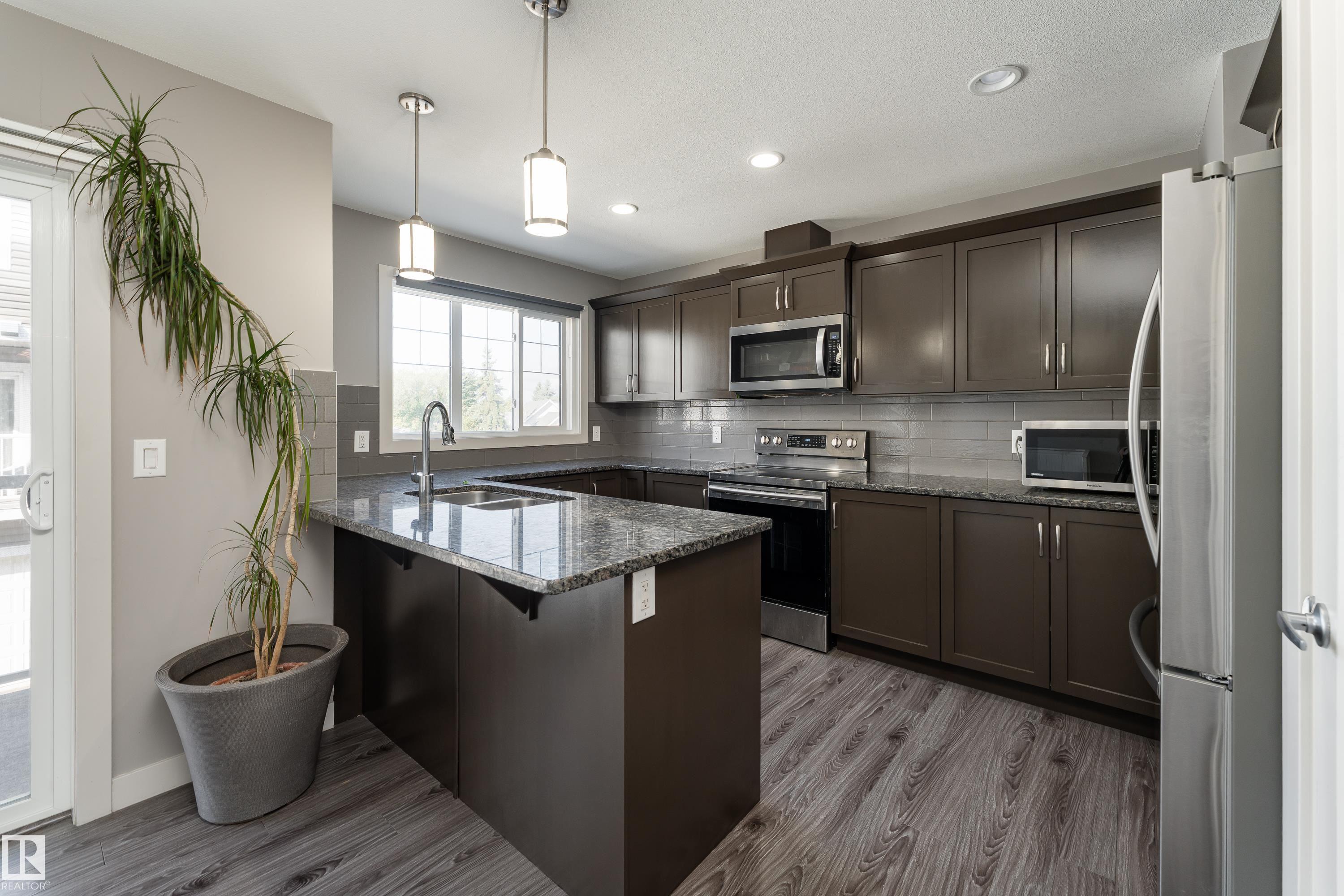 Photo 5 at 1 - 4205 30 Street NW, Larkspur, Edmonton
