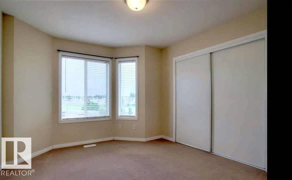 Photo 2 at 9 - 2505 42 Street NW, Bisset, Edmonton