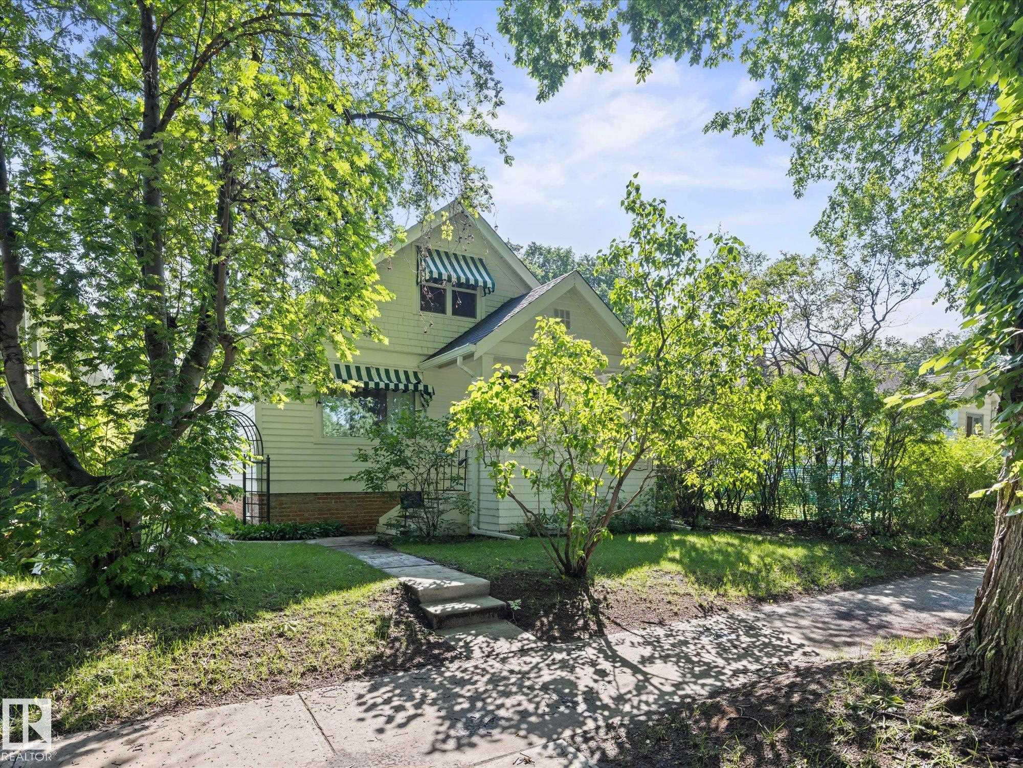 Photo 2 at 11331 66 Street NW, Highlands, Edmonton
