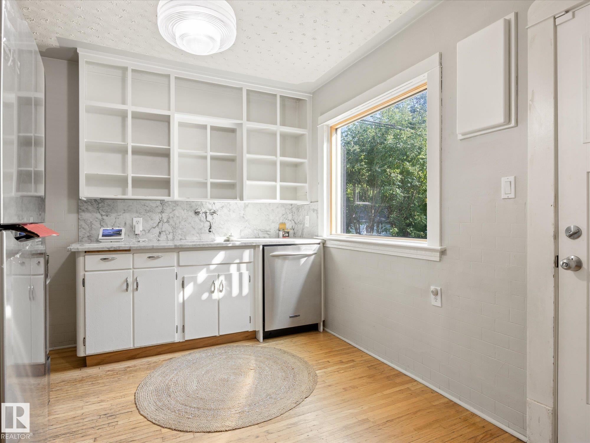Photo 12 at 11331 66 Street NW, Highlands, Edmonton