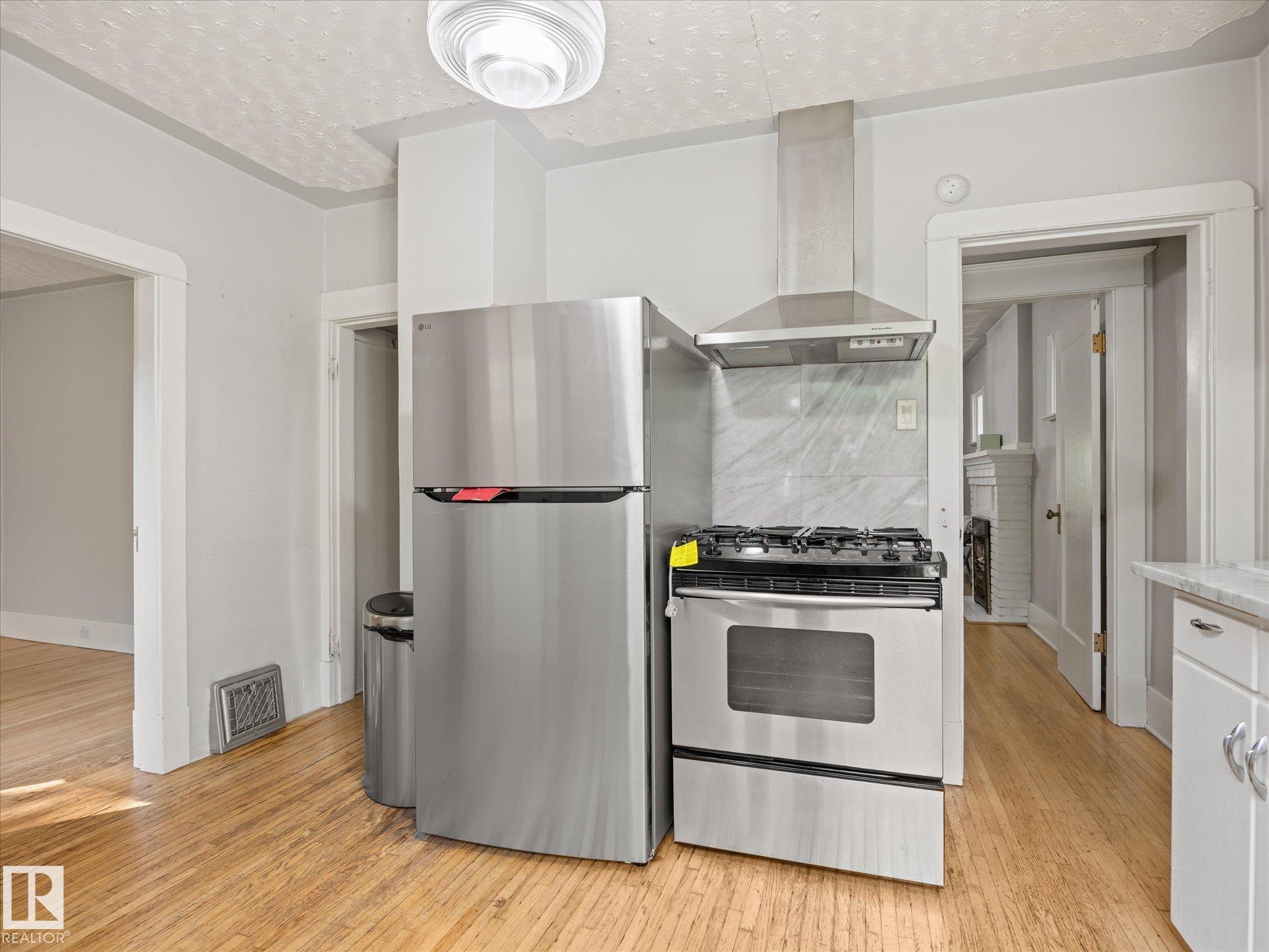 Photo 13 at 11331 66 Street NW, Highlands, Edmonton