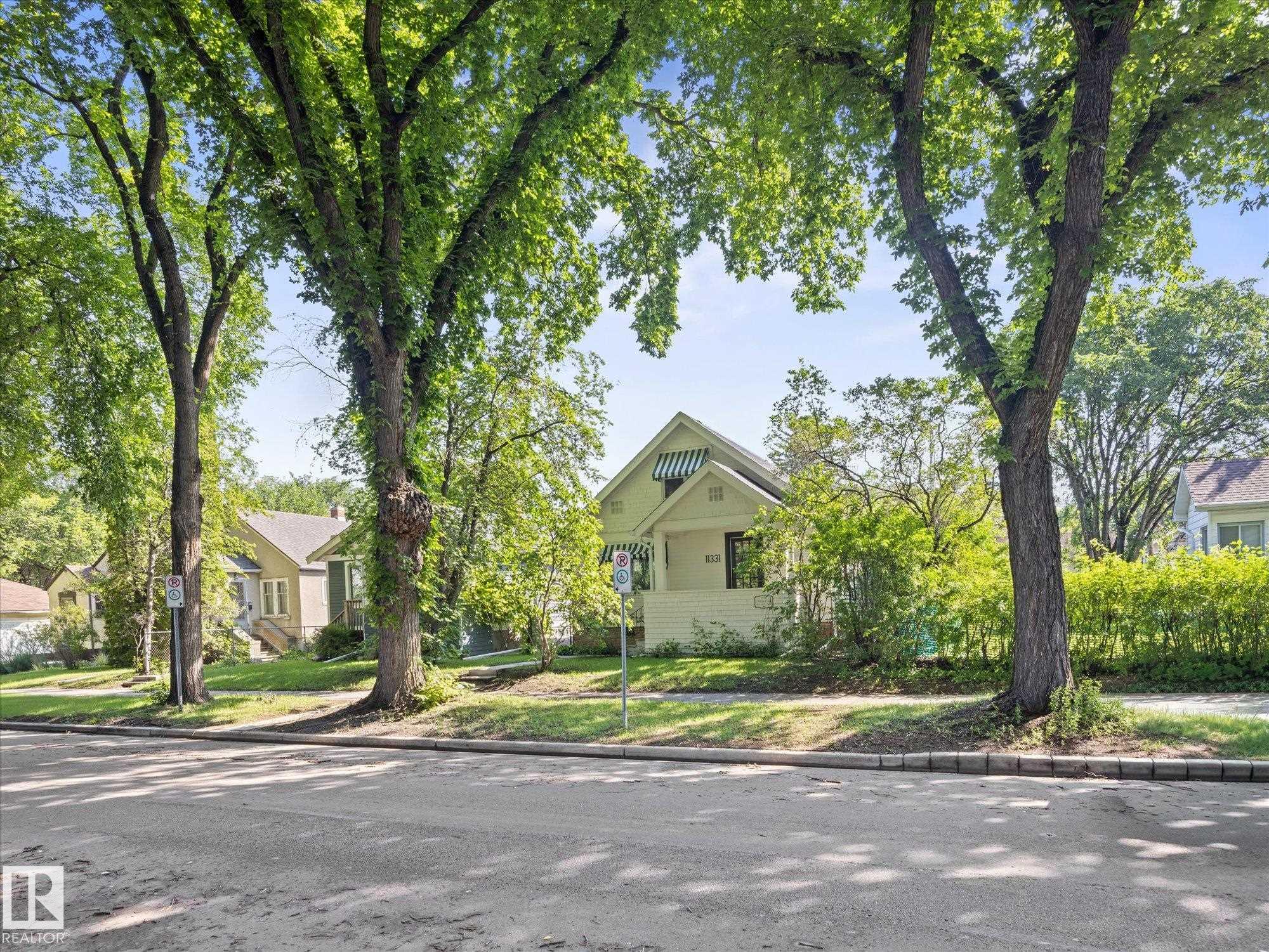 Photo 3 at 11331 66 Street NW, Highlands, Edmonton