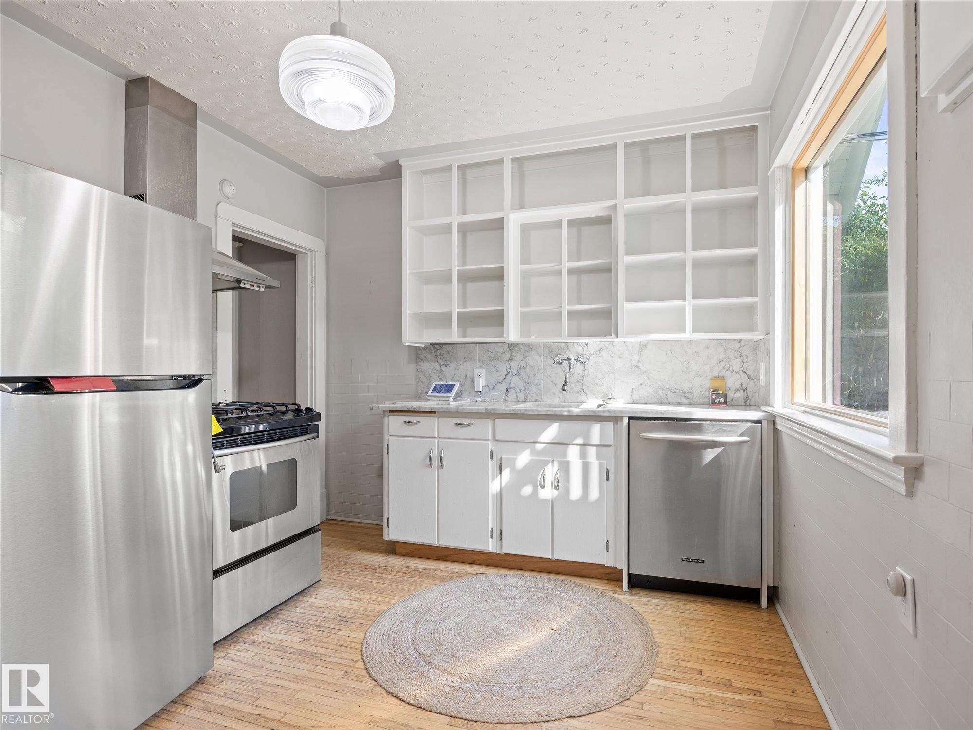 Photo 10 at 11331 66 Street NW, Highlands, Edmonton