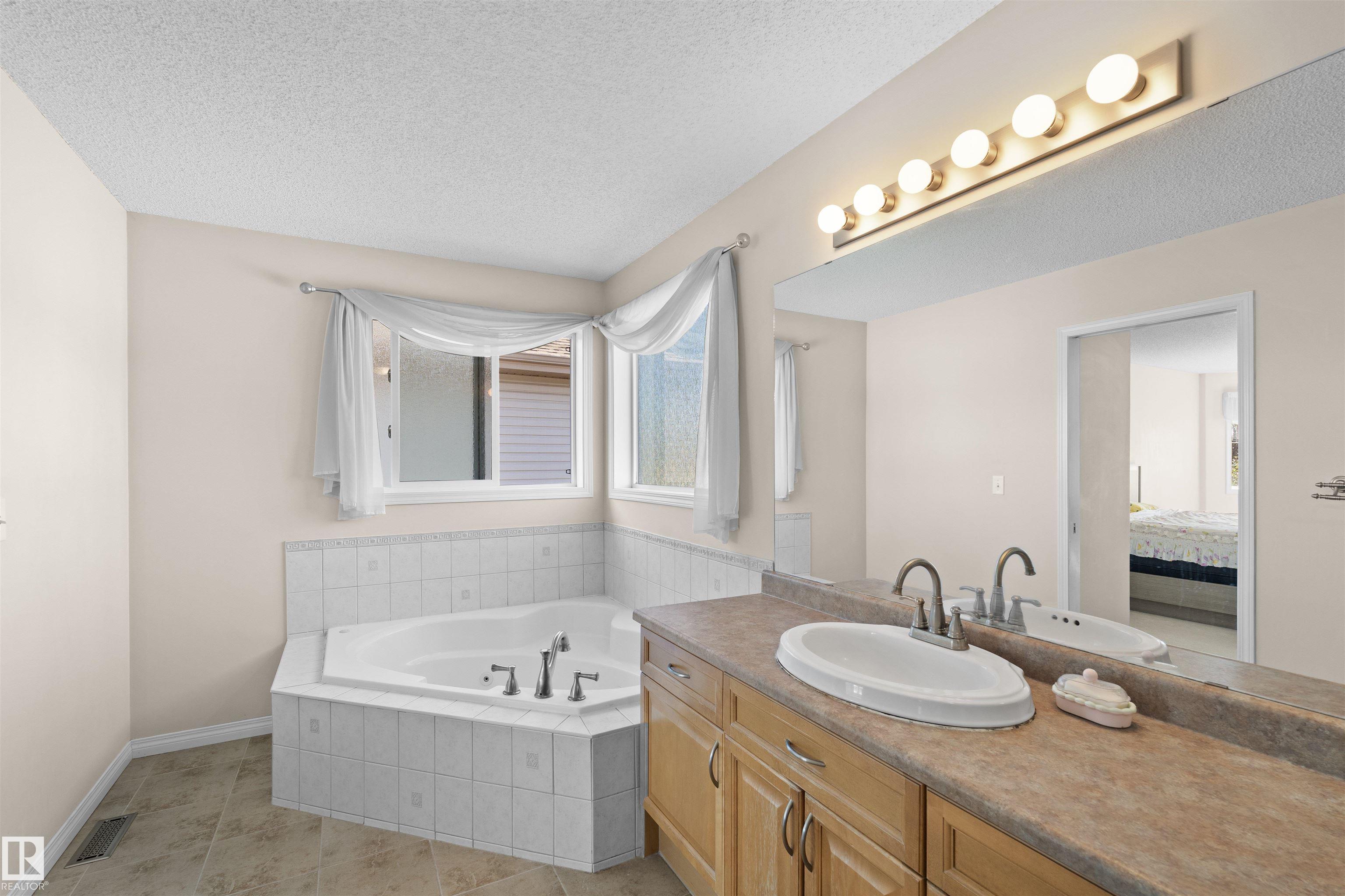 Photo 16 at 20616 56 Avenue NW, The Hamptons, Edmonton